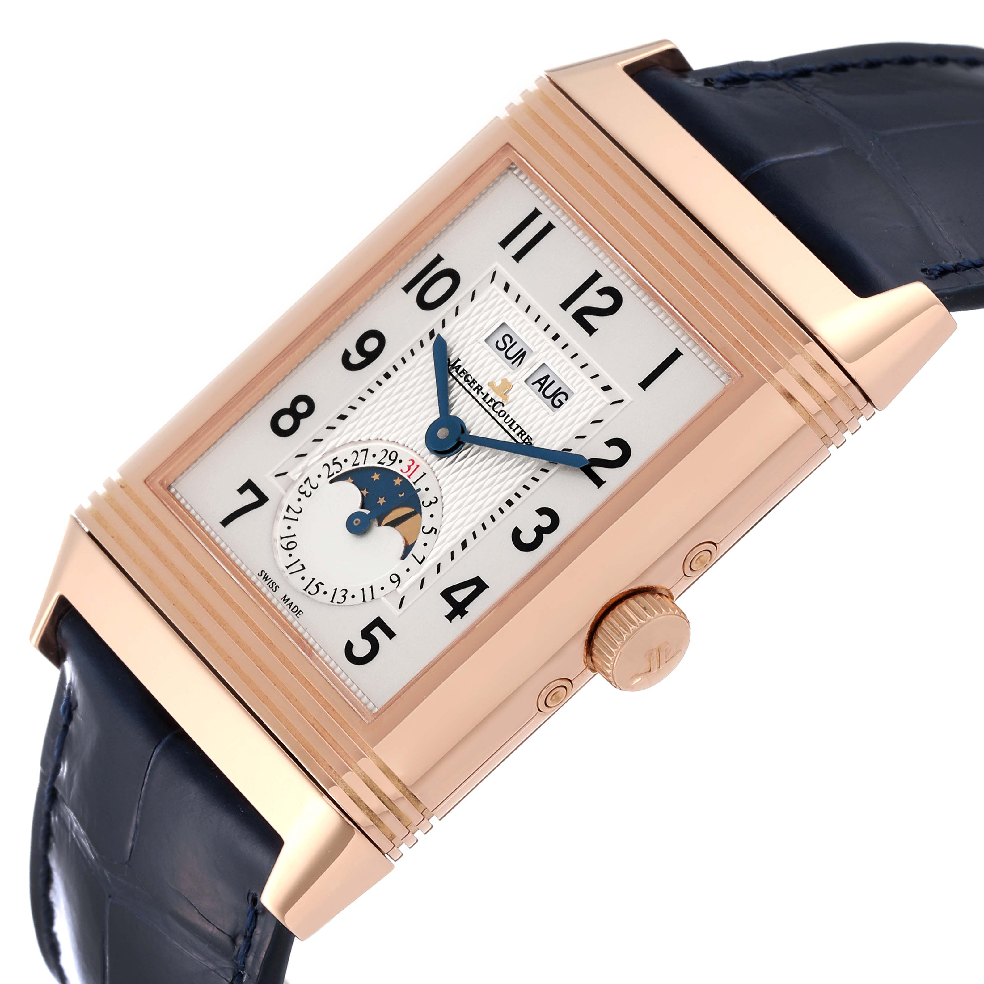 This image shows a Jaeger LeCoultre Reverso Q3752520 Men
s Rose Gold Silver Dial Q3752520 Men
s Rose Gold Silver Dial watch from an angled side view, showcasing the dial, crown, case, and strap connections.