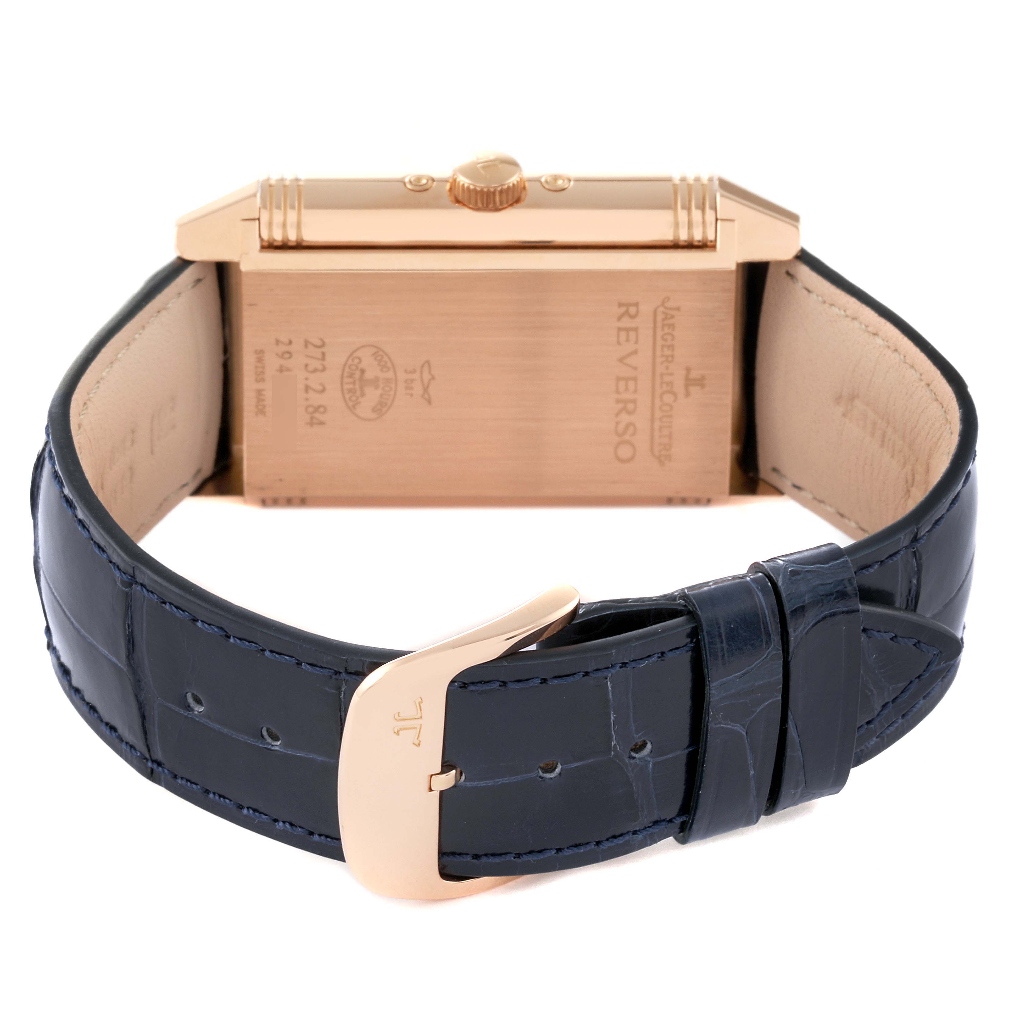 The image shows the back case and strap of the Jaeger LeCoultre Reverso Q3752520 Men
s Rose Gold Silver Dial Q3752520 Men
s Rose Gold Silver Dial watch at a rear angle.