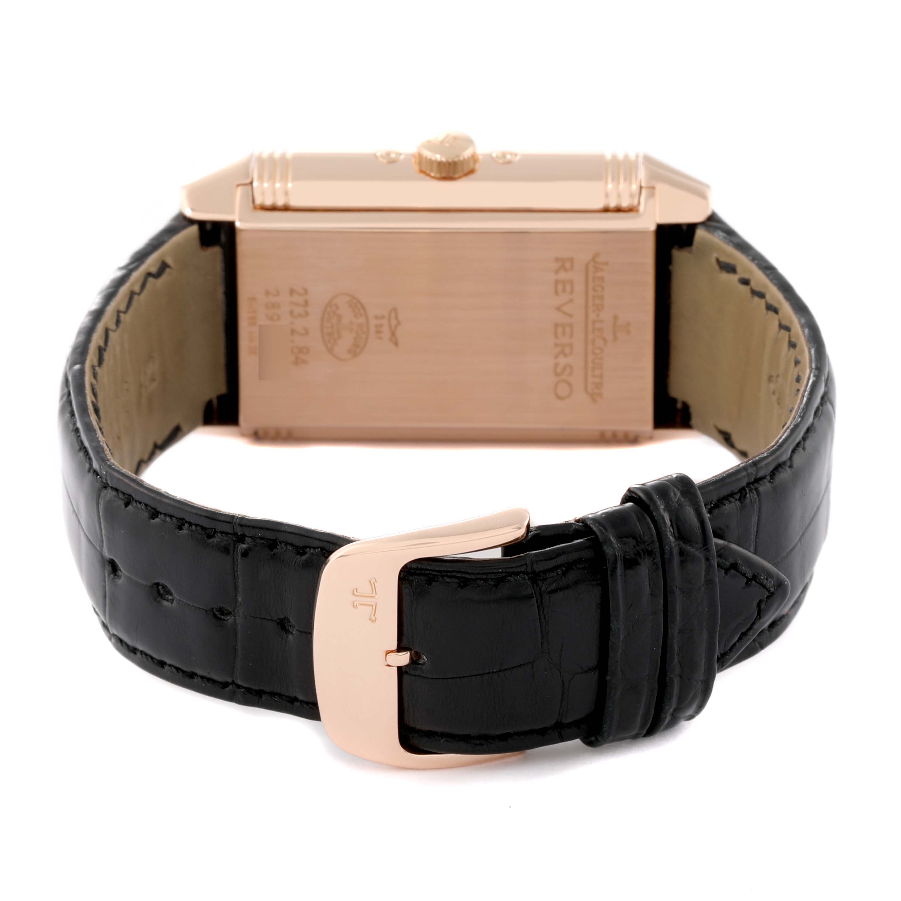 The image shows the back of a Jaeger LeCoultre Reverso Q3752520 Men's Rose Gold Silver Dial Q3752520 Men's Rose Gold Silver Dial watch, highlighting the caseback, crown, and clasp of the black leather strap.