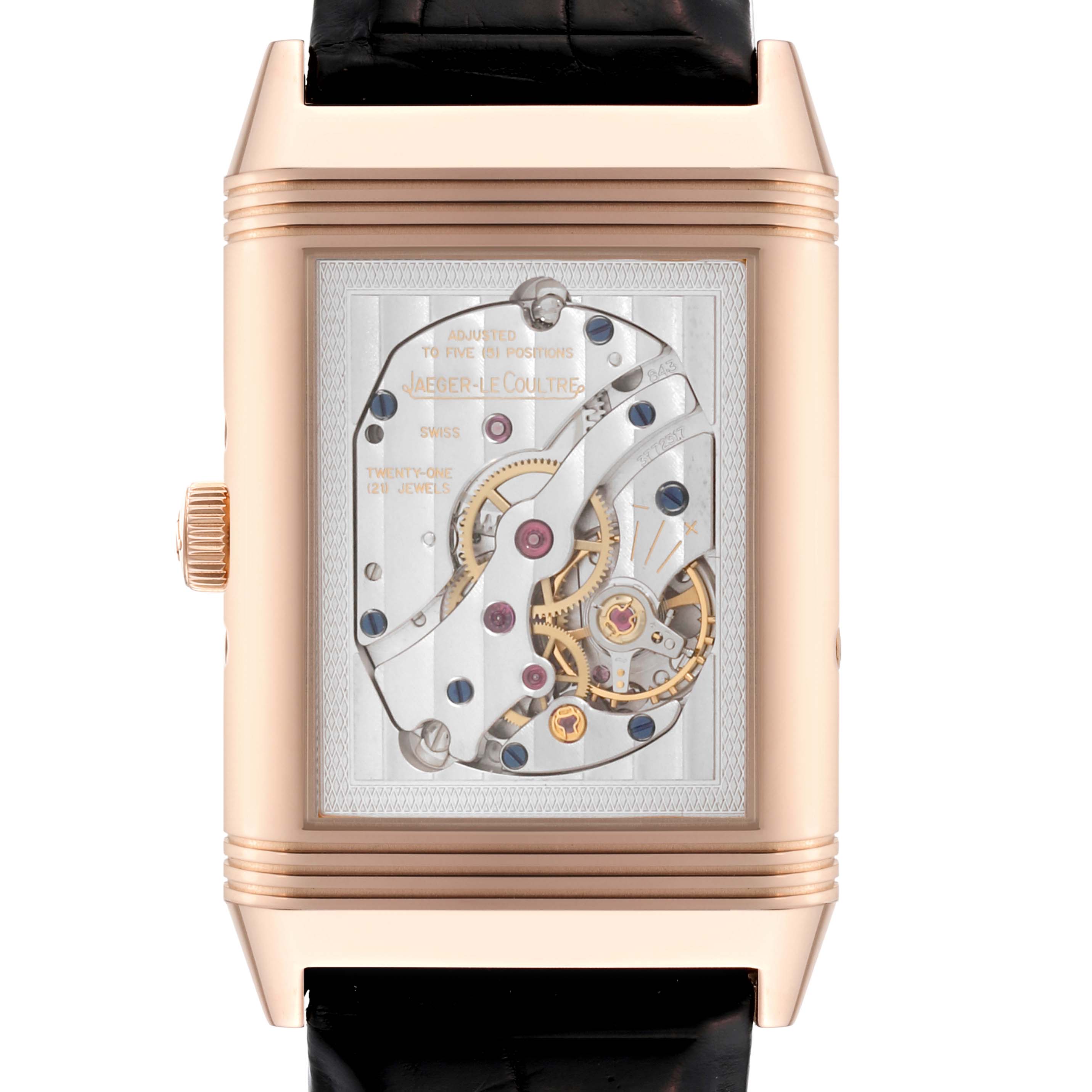 This is a close-up view of the rear side of a Jaeger-LeCoultre Reverso model, showcasing its exposed mechanical movement.