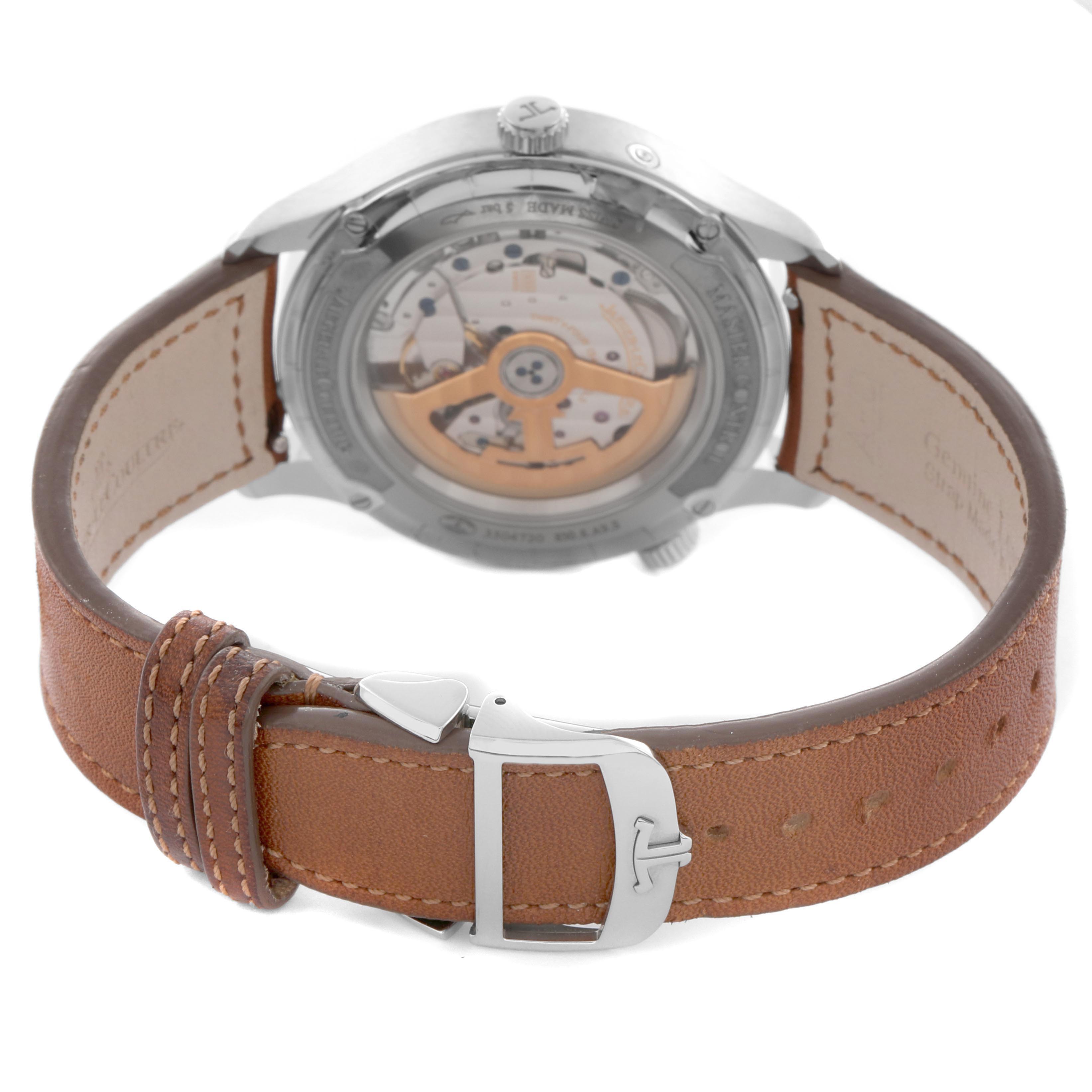 The Jaeger LeCoultre Master Q4128420 Men
s Stainless Steel Silver Dial Q4128420 Men
s Stainless Steel Silver Dial watch is shown from the back, highlighting the movement through the transparent case back and the leather strap with buckle.