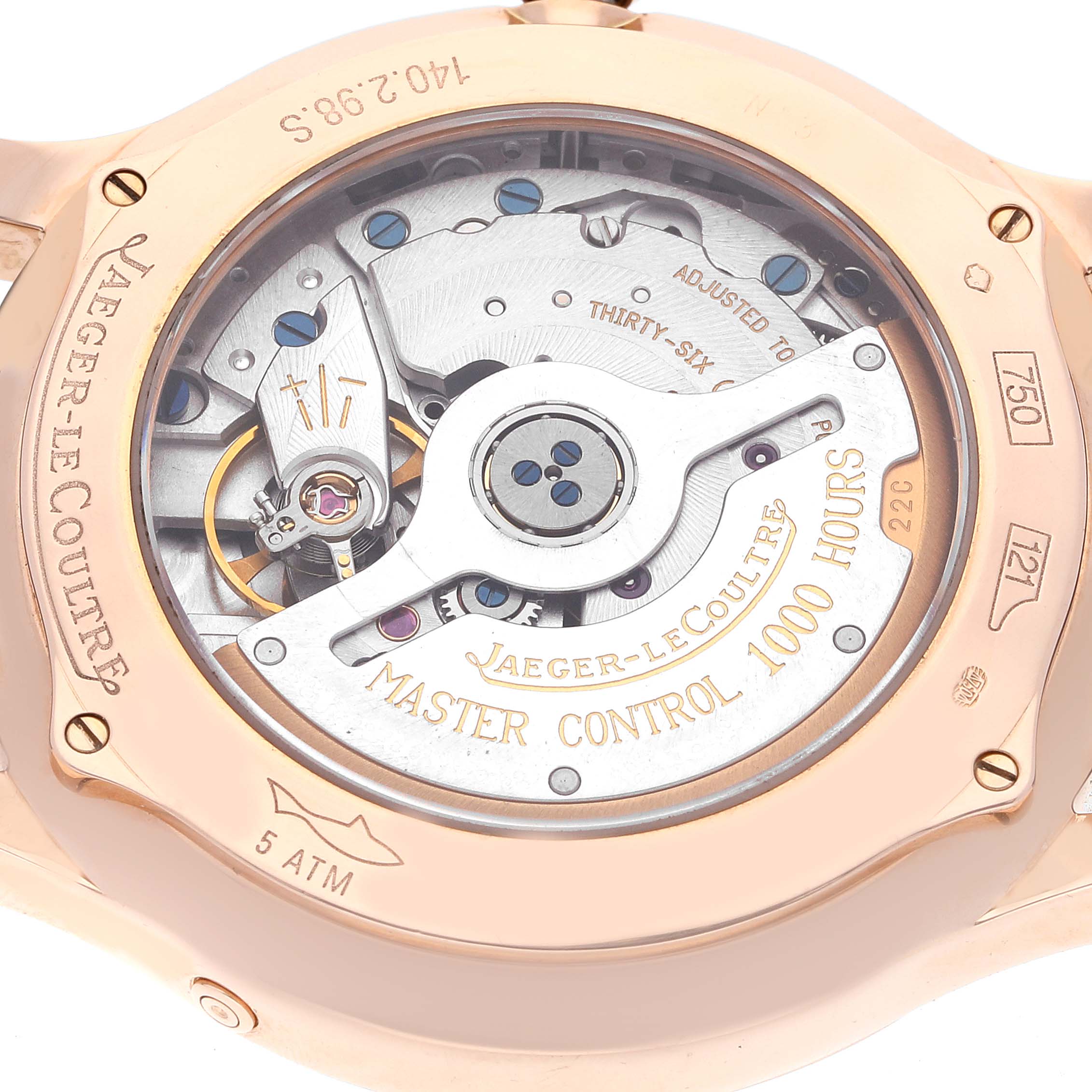 The image shows the back view of a Jaeger-LeCoultre Master Control 1000 Hours watch, highlighting its movement and engravings.