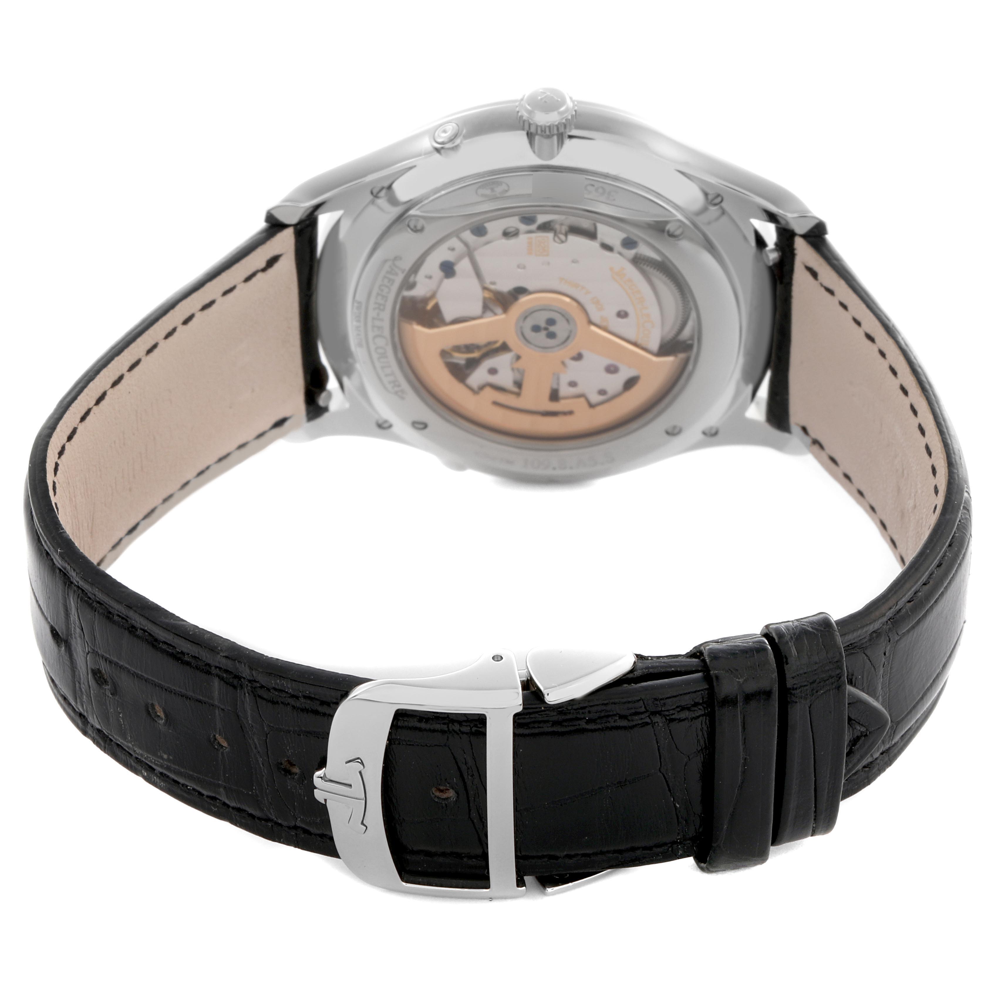 The Jaeger LeCoultre Master Q1368471 Men
s Stainless Steel Black Dial Q1368471 Men
s Stainless Steel Black Dial model is shown from the back, highlighting the movement and black leather strap with buckle.