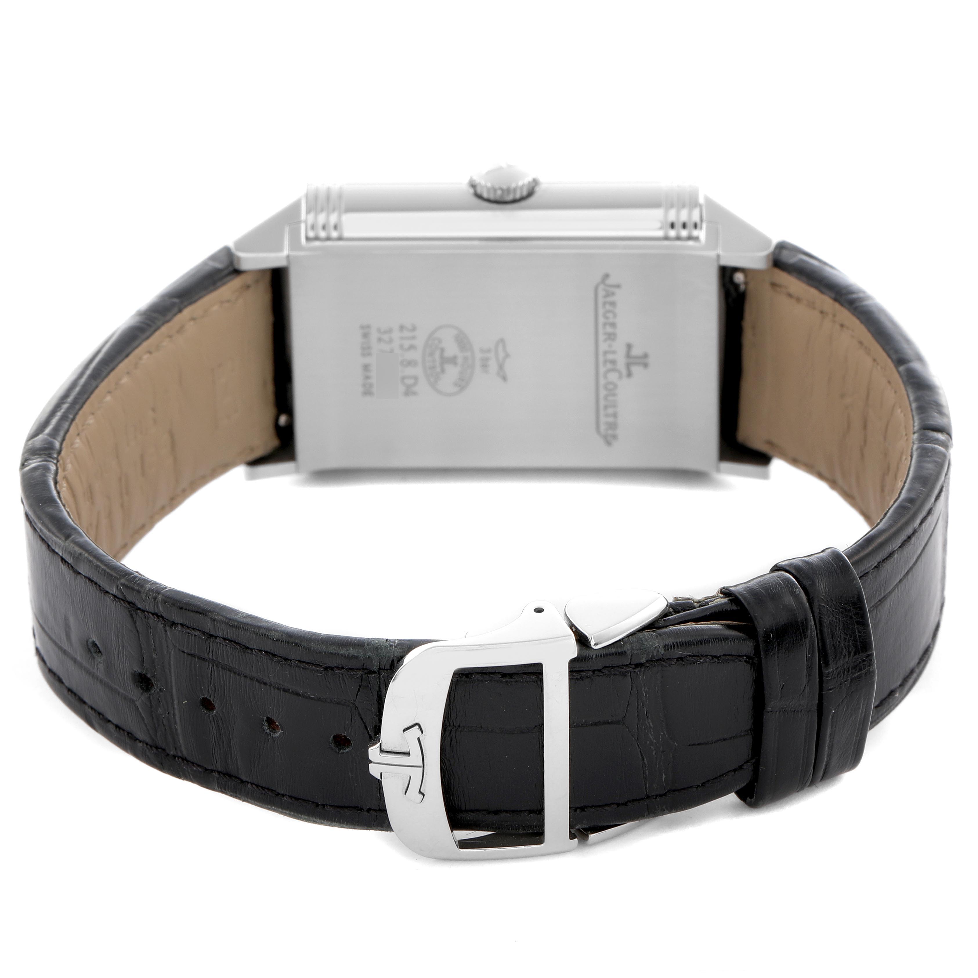 The image shows the back of a Jaeger LeCoultre Reverso Q3848420 Men
s Stainless Steel Black Dial Q3848420 Men
s Stainless Steel Black Dial watch, highlighting its caseback, crown, and black leather strap with buckle.