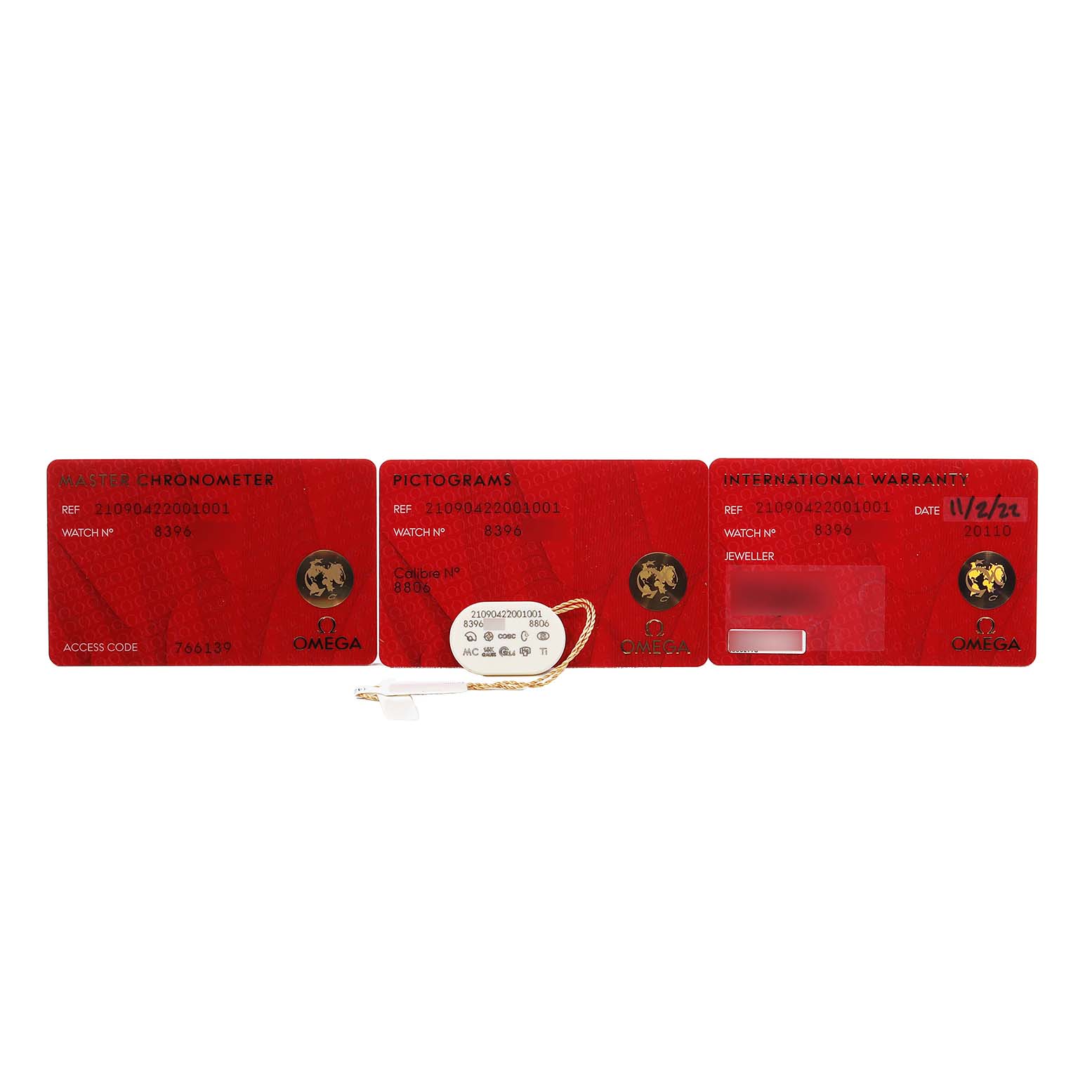 This image shows three red cards with information and a tag, related to the Omega Seamaster 210.90.42.20.01.001 Men's Titanium Brown Dial watch model.
