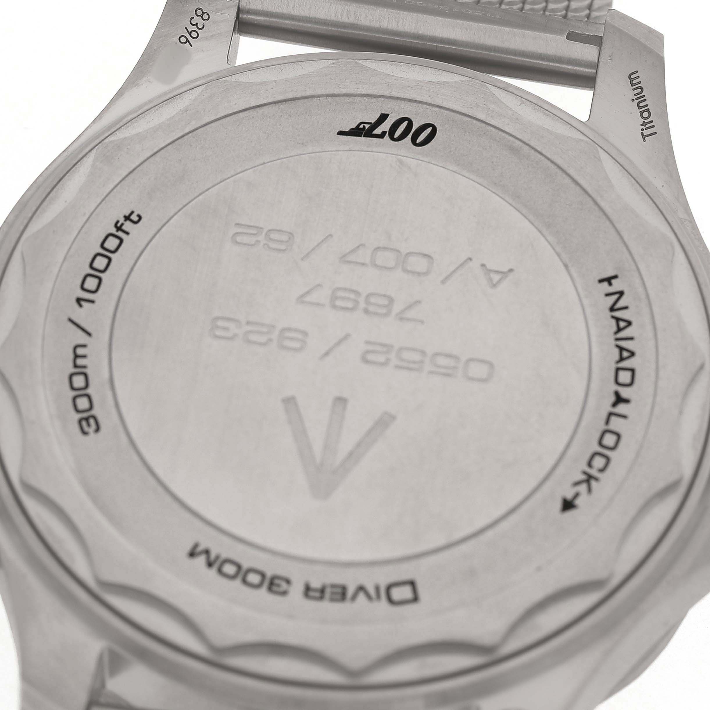 The image shows the case back of the Omega Seamaster 210.90.42.20.01.001 Men's Titanium Brown Dial watch, highlighting model details and "007" branding.