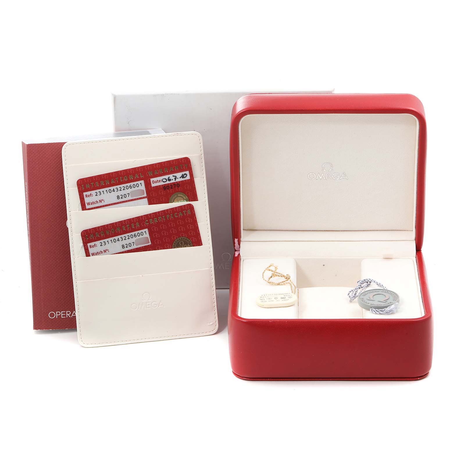 The image shows the packaging and accessories of an Omega Aqua Terra 231.10.42.21.06.001 Men
s Stainless Steel Grey Dial 231.10.42.21.06.001 Men
s Stainless Steel Grey Dial watch, including the box, warranty cards, tags, and a cardholder.