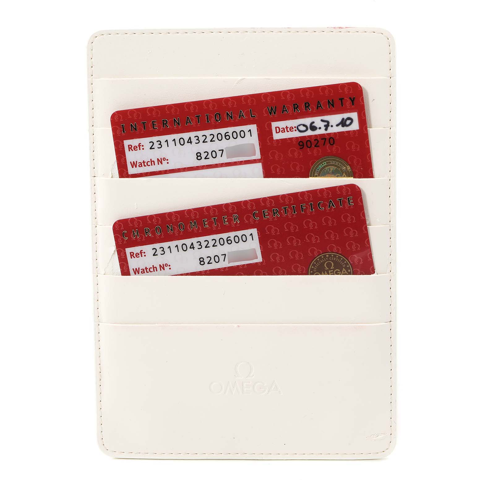 The image shows warranty and chronometer certificate cards in a white Omega cardholder for the Aqua Terra model.