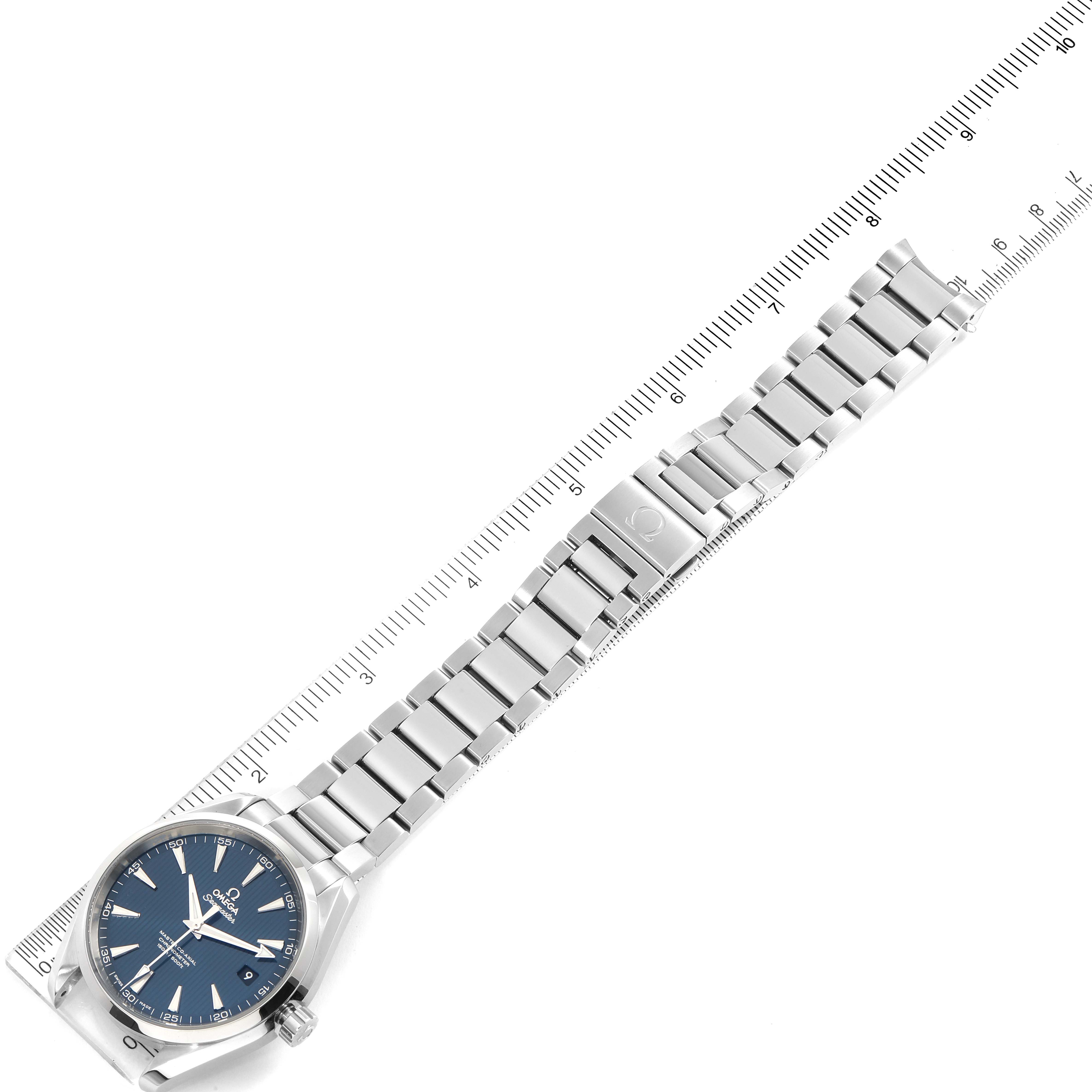 The image shows an Omega Aqua Terra 231.10.42.21.03.003 Men
s Stainless Steel Blue Dial 231.10.42.21.03.003 Men
s Stainless Steel Blue Dial watch laid flat with a ruler beside it, highlighting its full length.