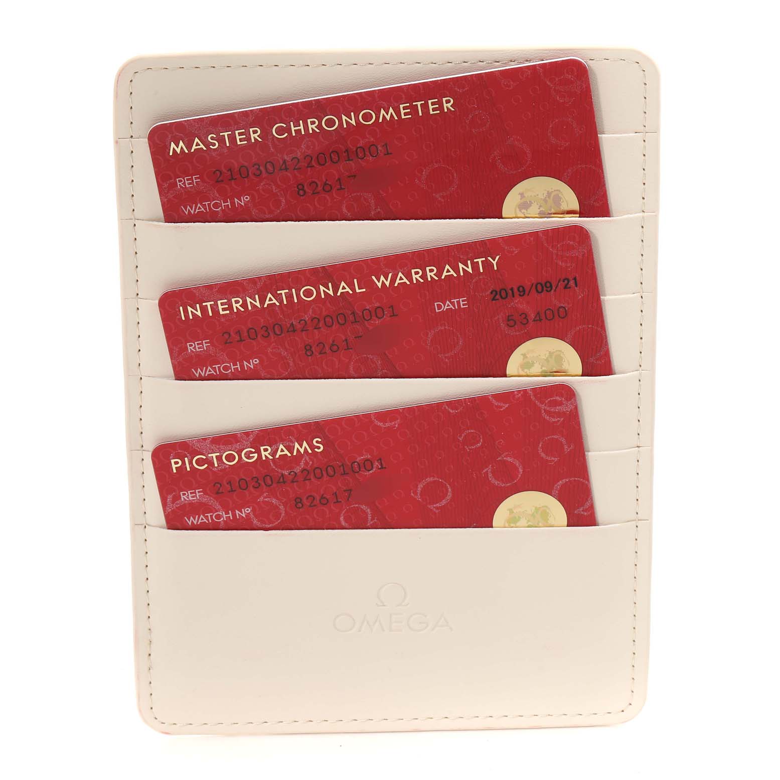 The image shows the warranty and certification cards in a holder for an Omega Seamaster 210.30.42.20.01.001 Men's Stainless Steel Black Dial 210.30.42.20.01.001 Men's Stainless Steel Black Dial watch.