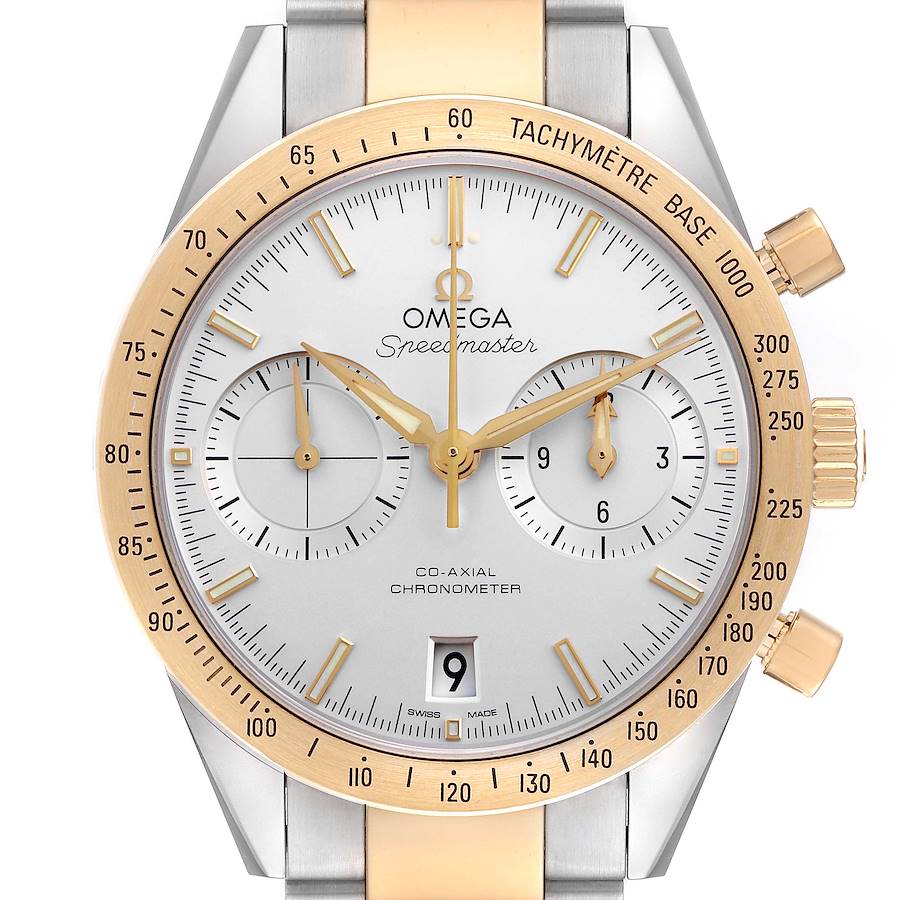The Omega Speedmaster watch is shown from the front, highlighting the dial, bezel, subdials, and crown.