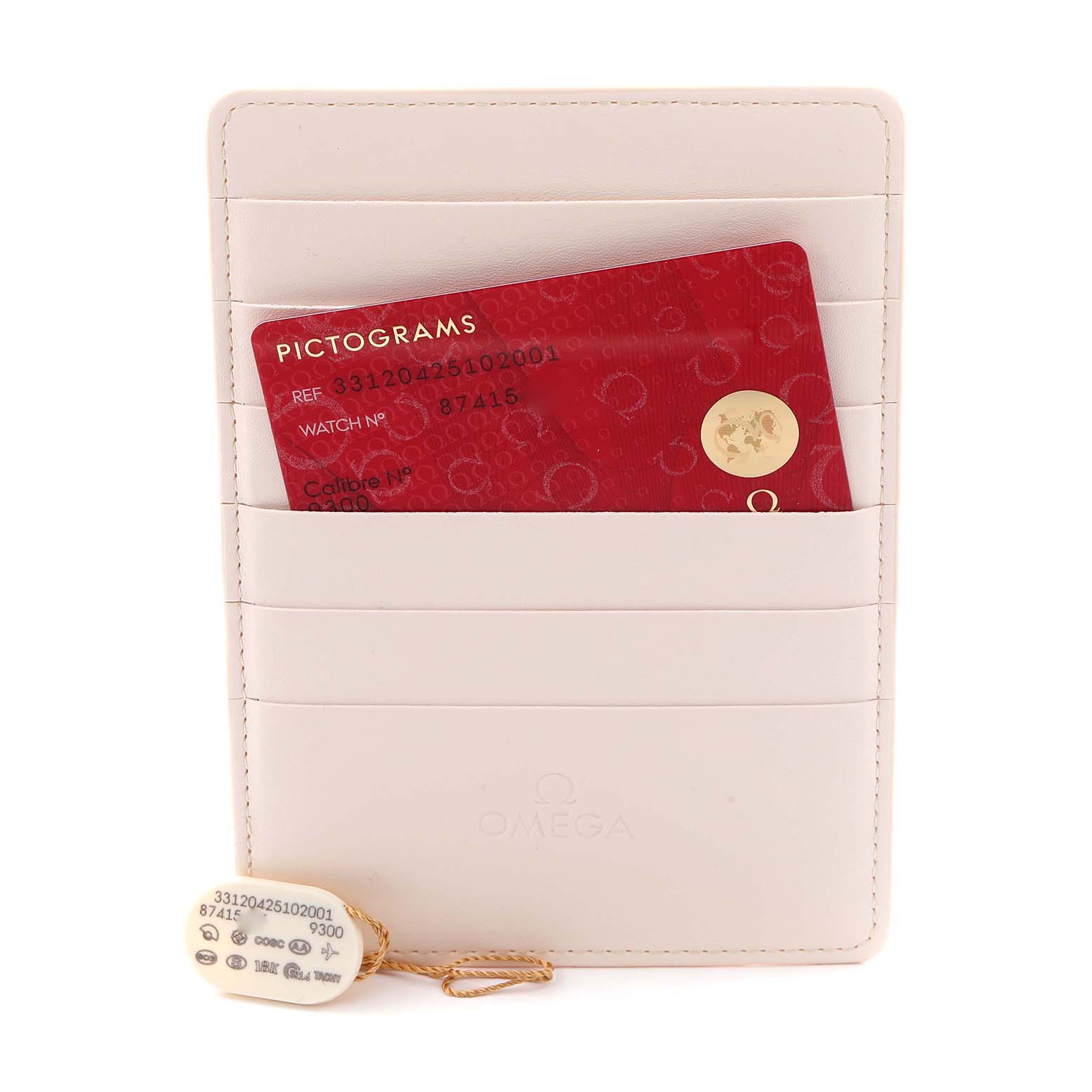 The image shows Omega Speedmaster 331.20.42.51.02.001 Men
s Steel and Gold (two tone) Silver Dial 331.20.42.51.02.001 Men
s Steel and Gold (two tone) Silver Dial accessories, including a pictograms card and a tag, in a branded cardholder.