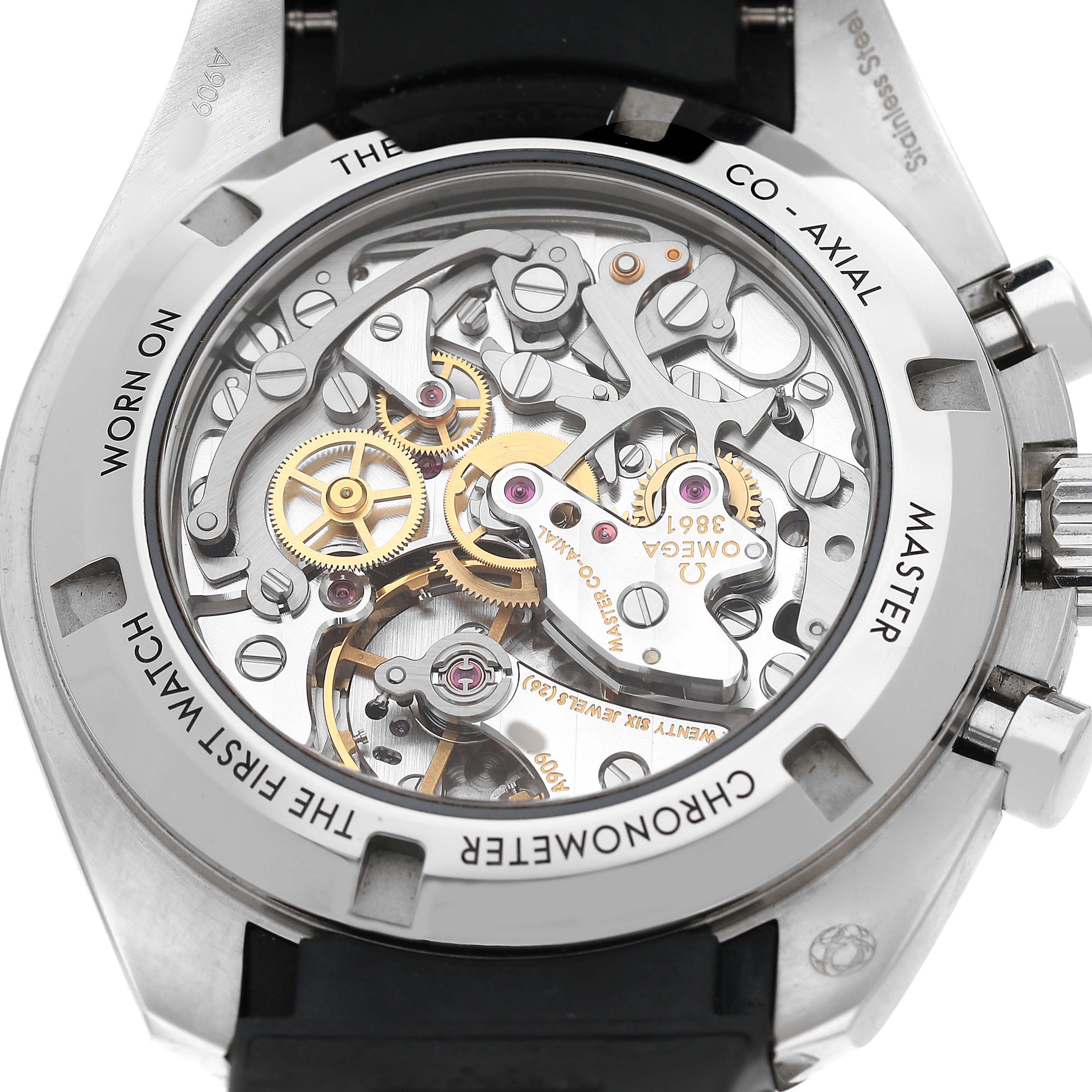 The image shows the back of the Omega Speedmaster 310.32.42.50.04.001 Men's Stainless Steel White Dial, revealing its intricate internal mechanism and Co-Axial components.