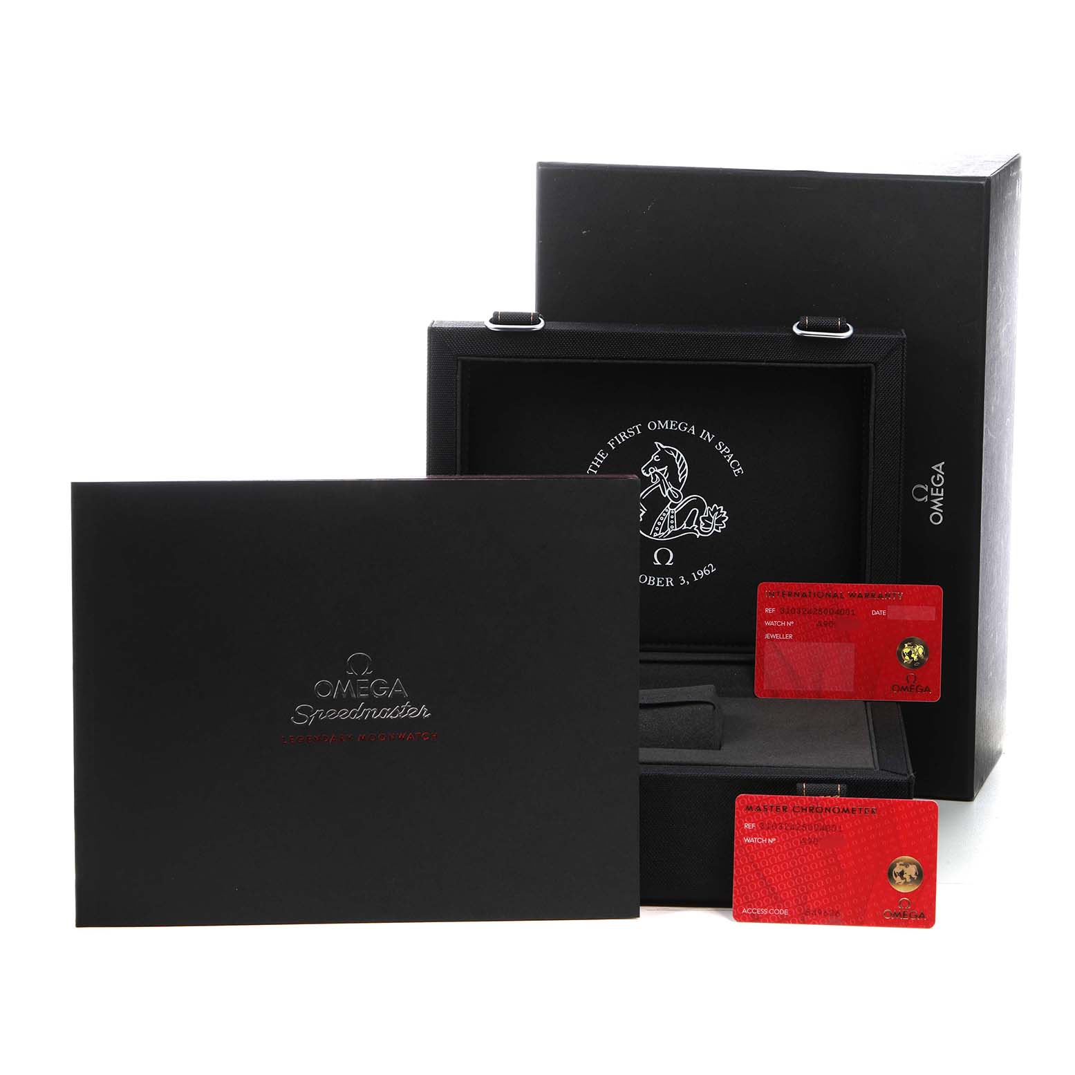 The image shows the Omega Speedmaster 310.32.42.50.04.001 Men's Stainless Steel White Dial box, certificates, and cards, angled slightly from the front.