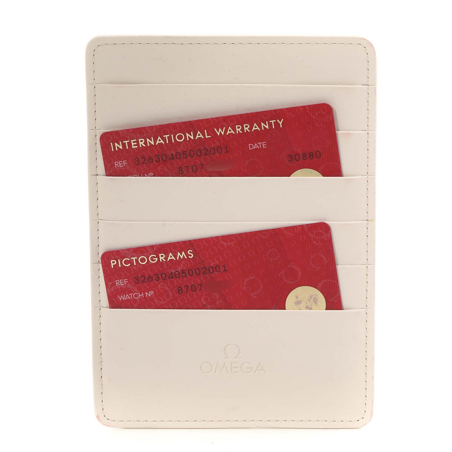 The image shows the warranty cards for Omega Speedmaster 326.30.40.50.02.001 Men
s Stainless Steel Silver Dial 326.30.40.50.02.001 Men
s Stainless Steel Silver Dial in a white cardholder, captured from above.