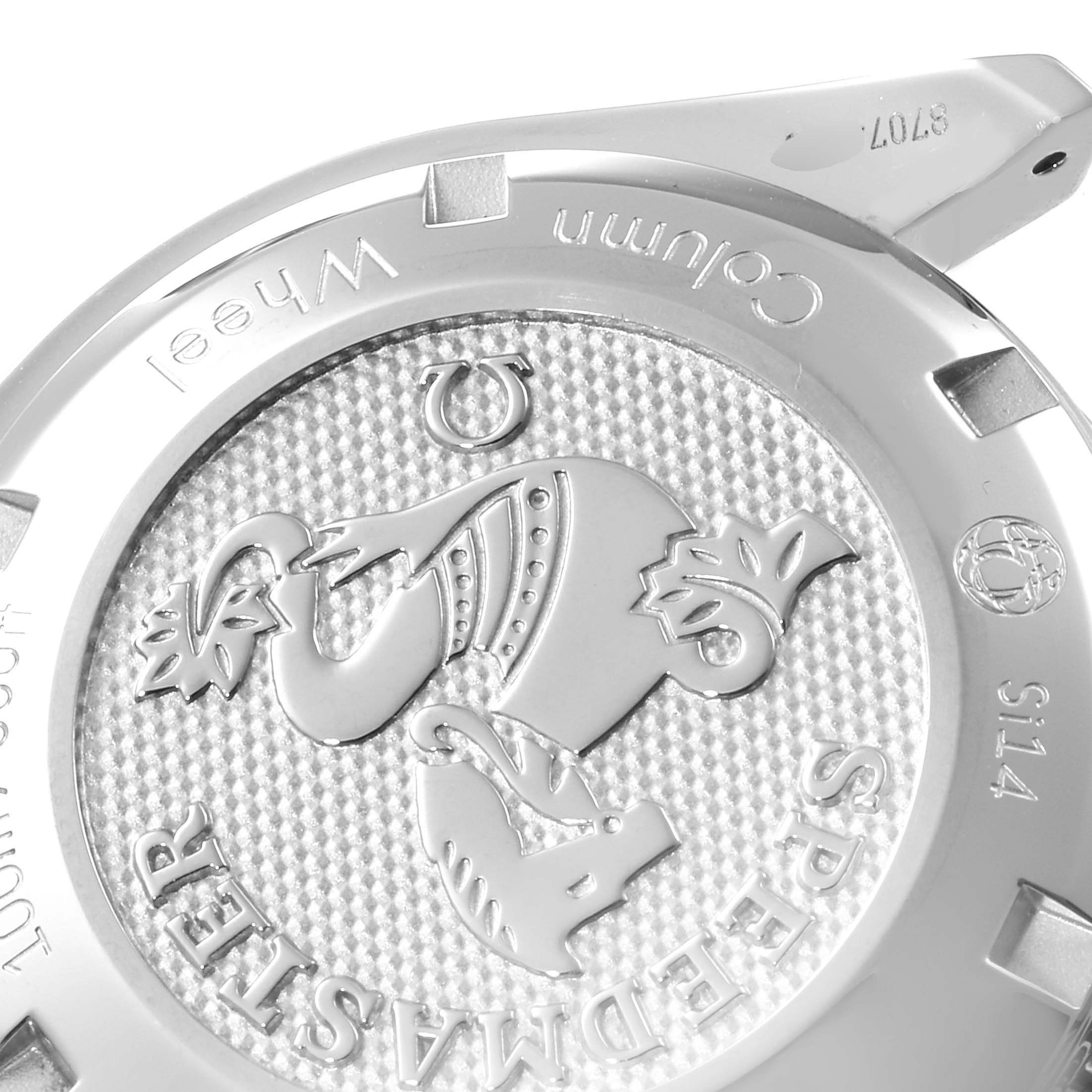 The image shows the case back of an Omega Speedmaster 326.30.40.50.02.001 Men
s Stainless Steel Silver Dial 326.30.40.50.02.001 Men
s Stainless Steel Silver Dial watch, featuring an engraved emblem and text.