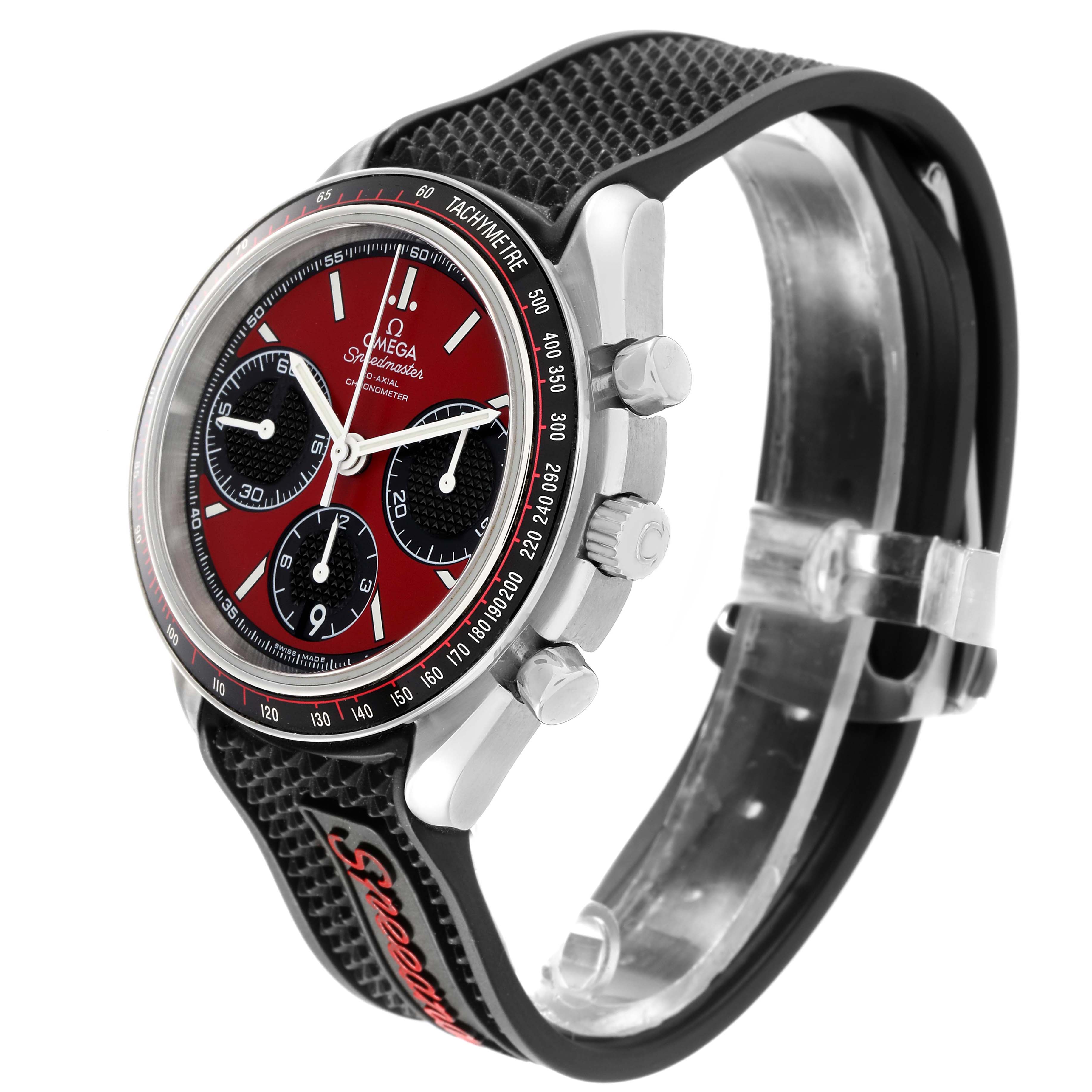 The Omega Speedmaster 326.32.40.50.11.001 Men's Stainless Steel Red Dial watch is shown at a 3/4 angle, highlighting the dial, tachymeter bezel, pushers, and strap.