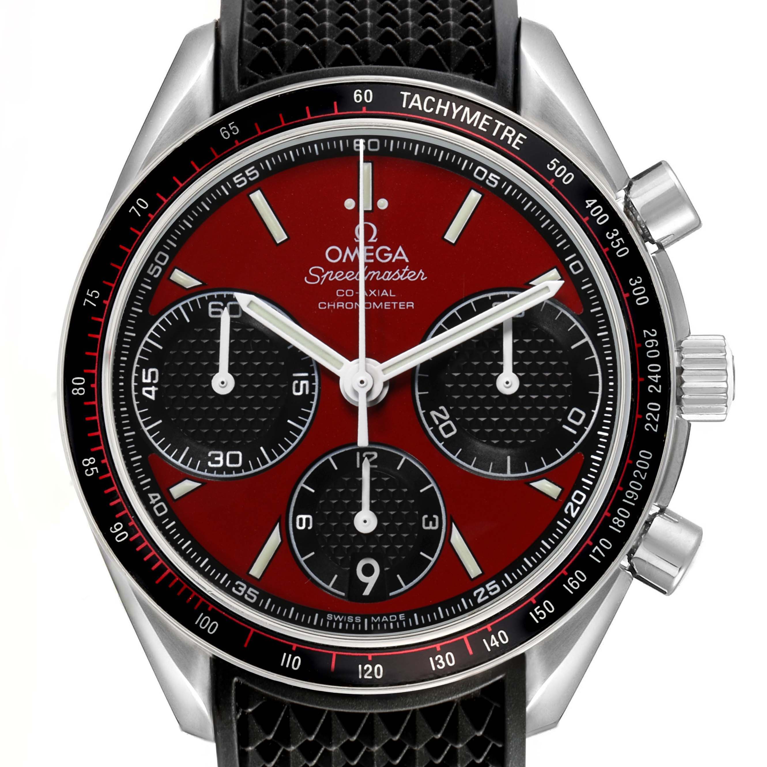 The Omega Speedmaster 326.32.40.50.11.001 Men's Stainless Steel Red Dial watch is shown from a front angle, highlighting its red dial, chronograph subdials, and tachymetric bezel.