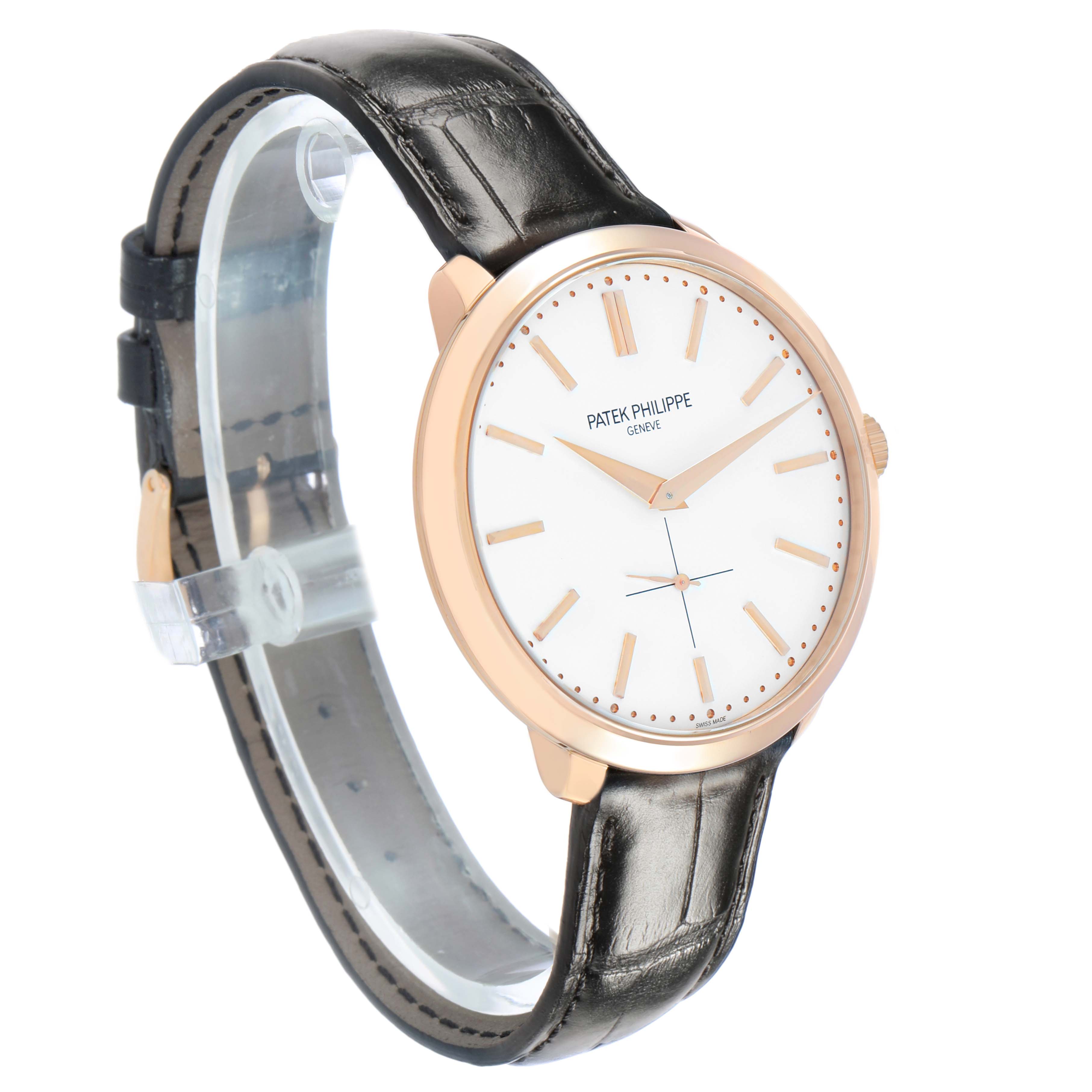 The Patek Philippe Calatrava 5123R Men's Rose Gold Silver Dial watch is shown at a three-quarter angle, highlighting the face, strap, and side profile.