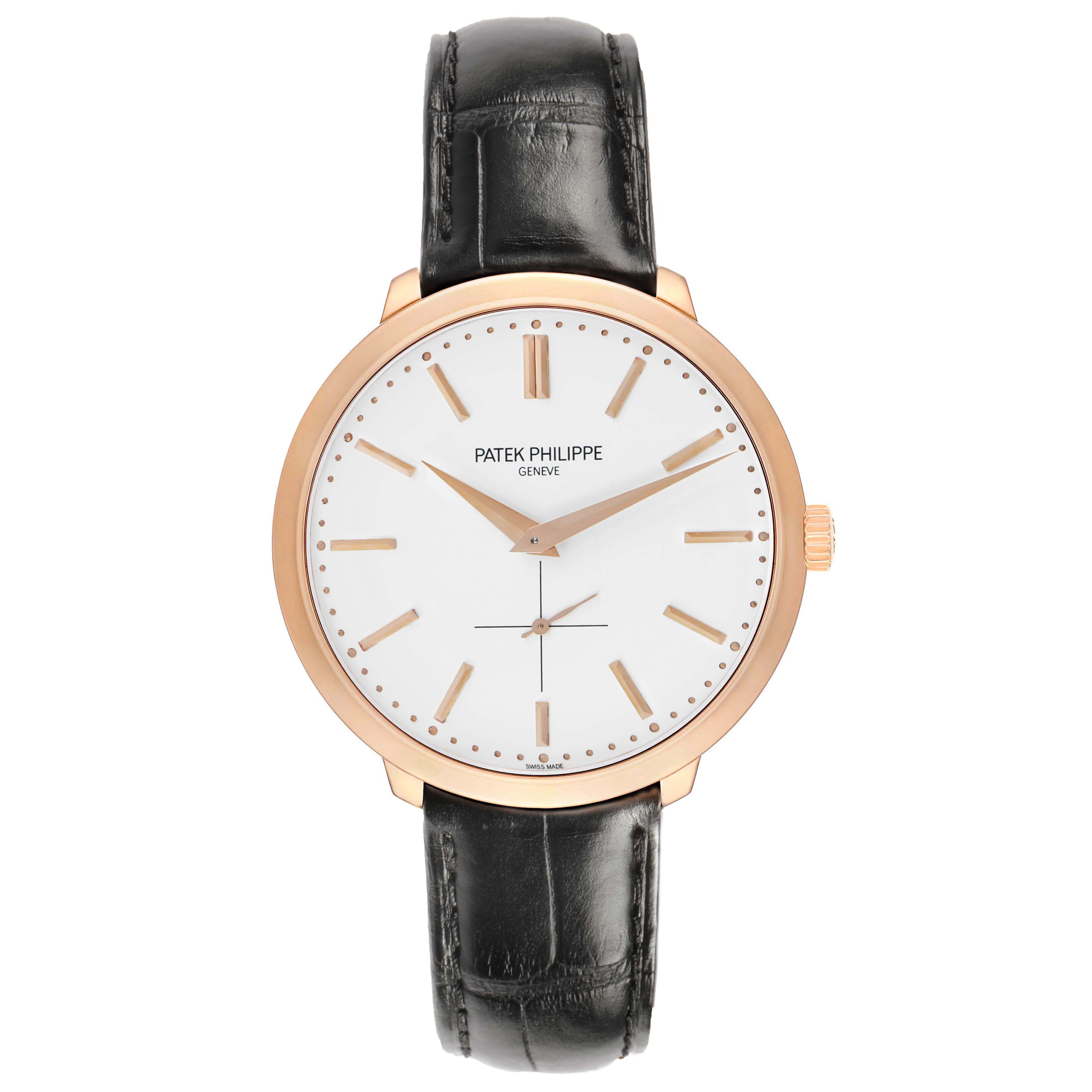 The Patek Philippe Calatrava 5123R Men's Rose Gold Silver Dial model is shown from a front angle, highlighting its dial, hands, and leather strap.