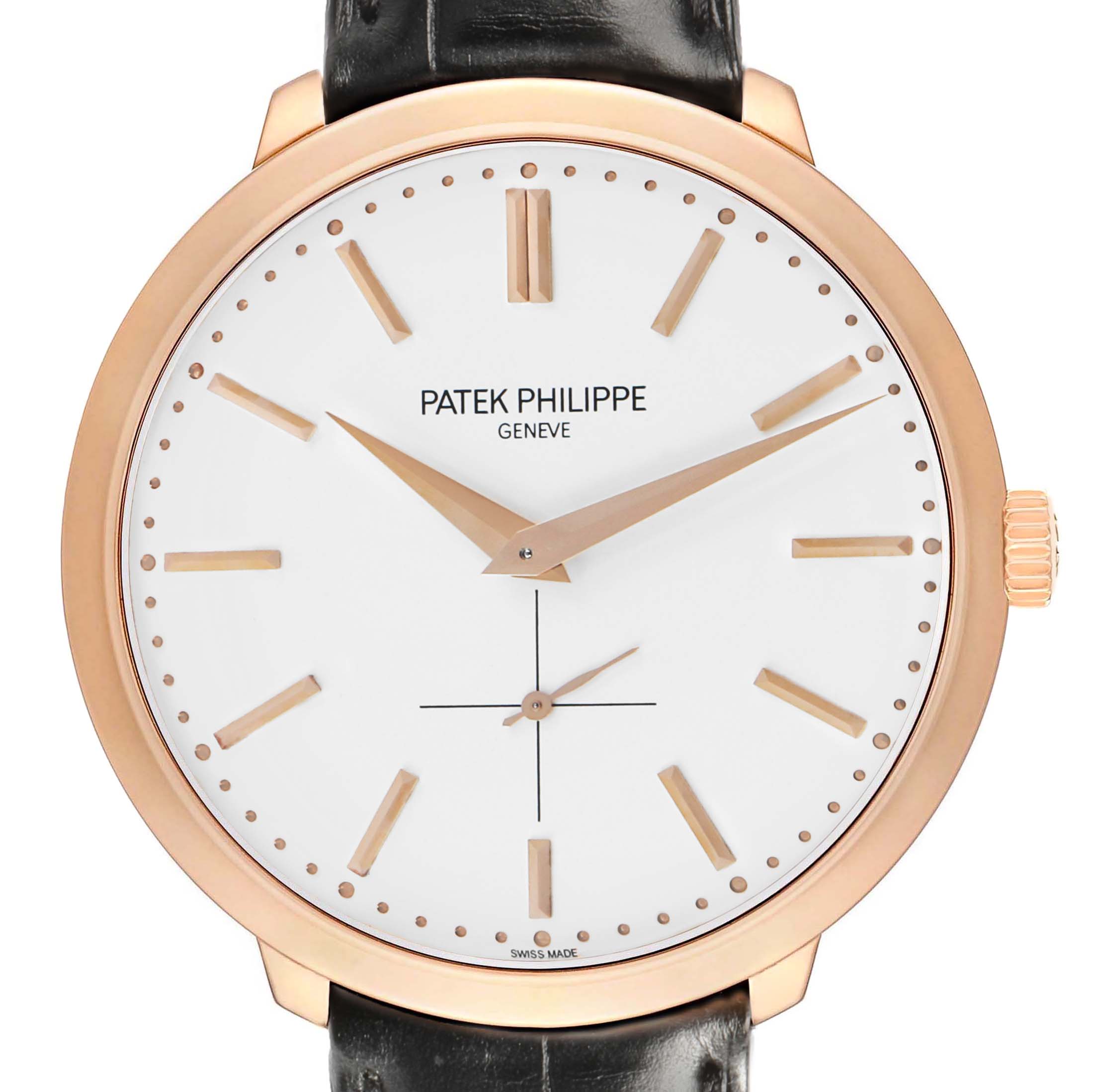 The Calatrava model by Patek Philippe is shown from the front, highlighting its dial, hands, and leather strap.