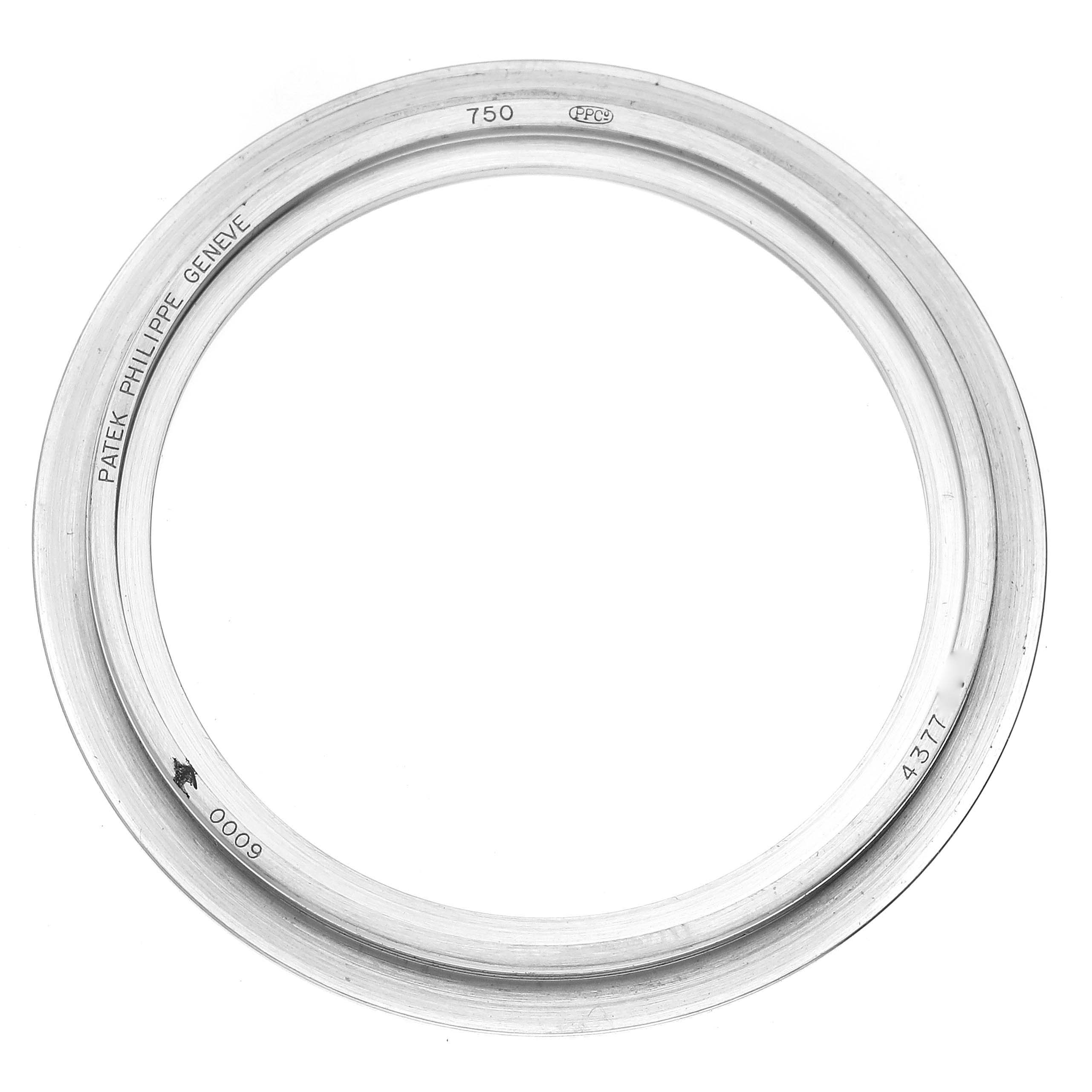 This image shows a close-up of a circular bezel for the Patek Philippe Calatrava 6000G-012 Men's White Gold Blue Dial 6000G-012 Men's White Gold Blue Dial watch.