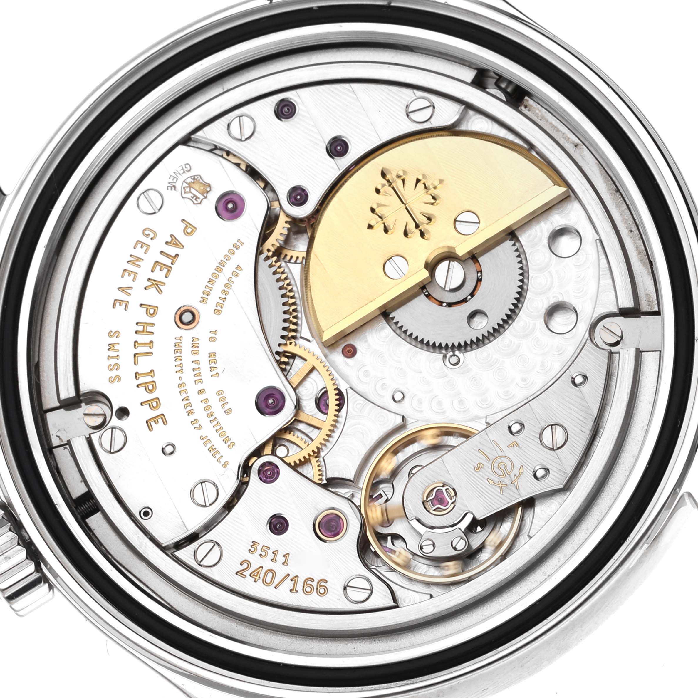 This image shows the intricate movement mechanism of a Patek Philippe Calatrava 6000G-012 Men's White Gold Blue Dial 6000G-012 Men's White Gold Blue Dial watch from a top-down angle.