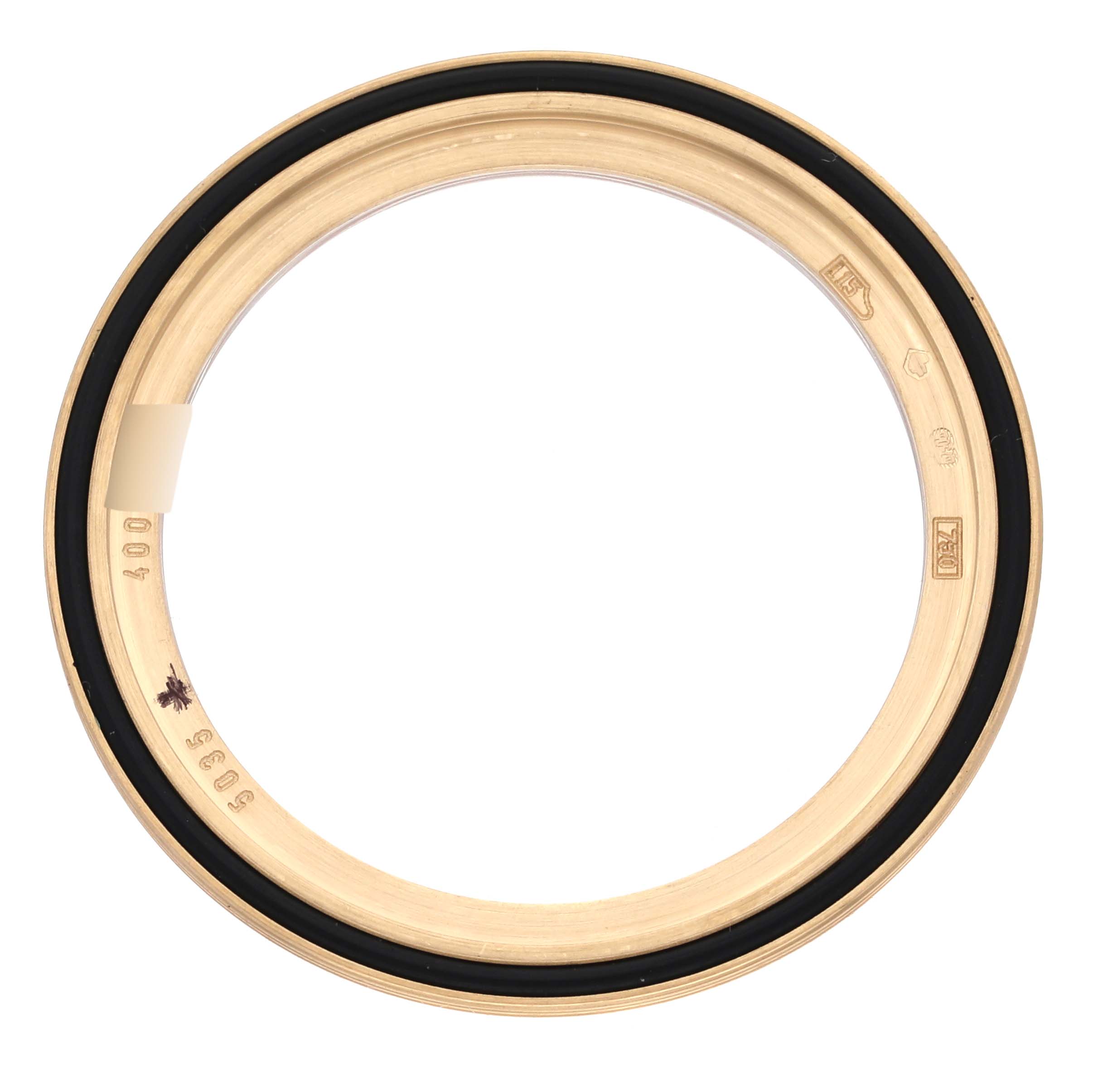 This image shows the bezel from a Complications model by Patek Philippe, viewed from a top-down angle.