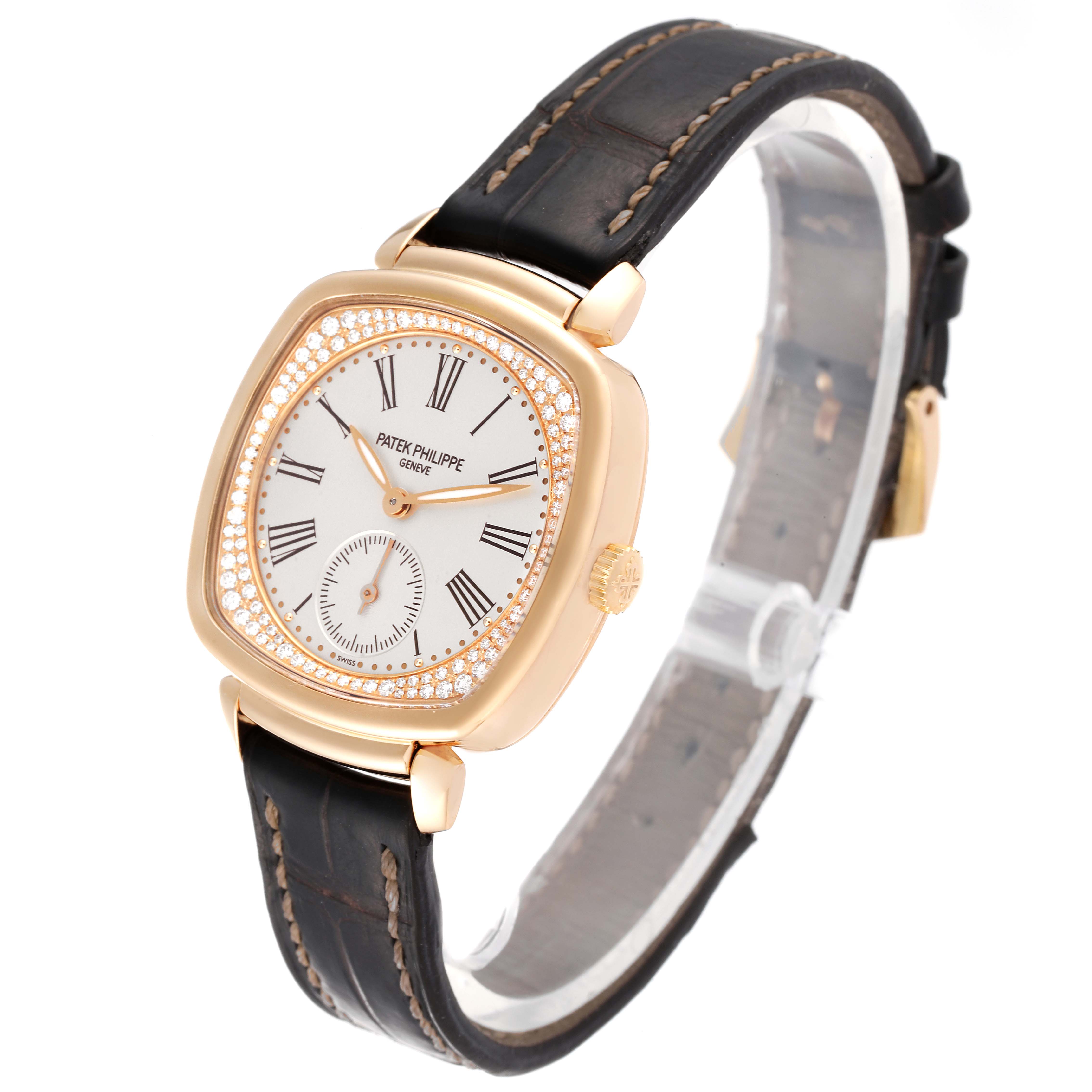 This image shows a Patek Philippe Gondolo 7041R-001 Women
s Rose Gold Silver Dial 7041R-001 Women
s Rose Gold Silver Dial watch from a three-quarter angle, highlighting its face, case, and strap.