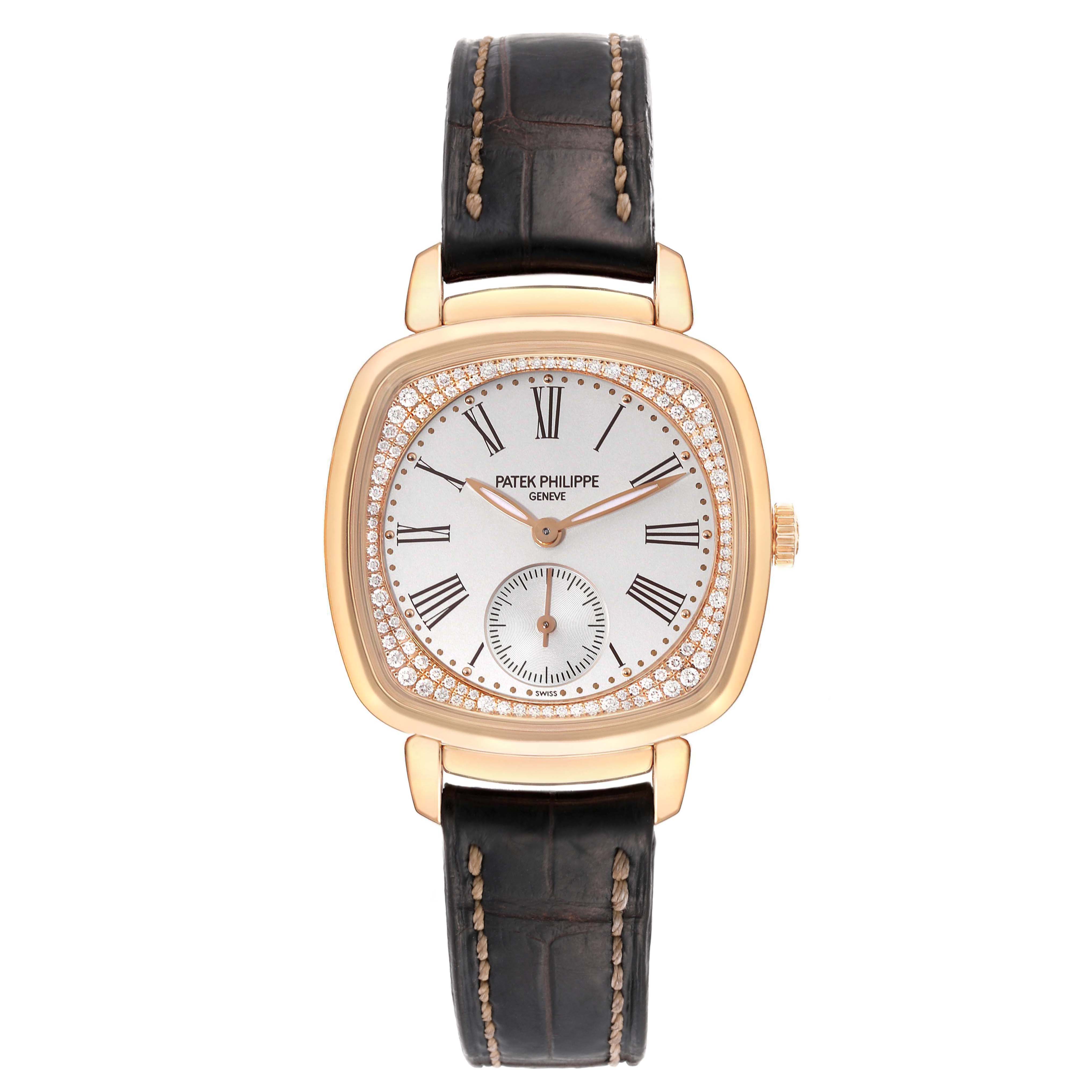 The Patek Philippe Gondolo 7041R-001 Women
s Rose Gold Silver Dial 7041R-001 Women
s Rose Gold Silver Dial watch is shown from the front, featuring a gold case, Roman numeral dial, and leather strap.