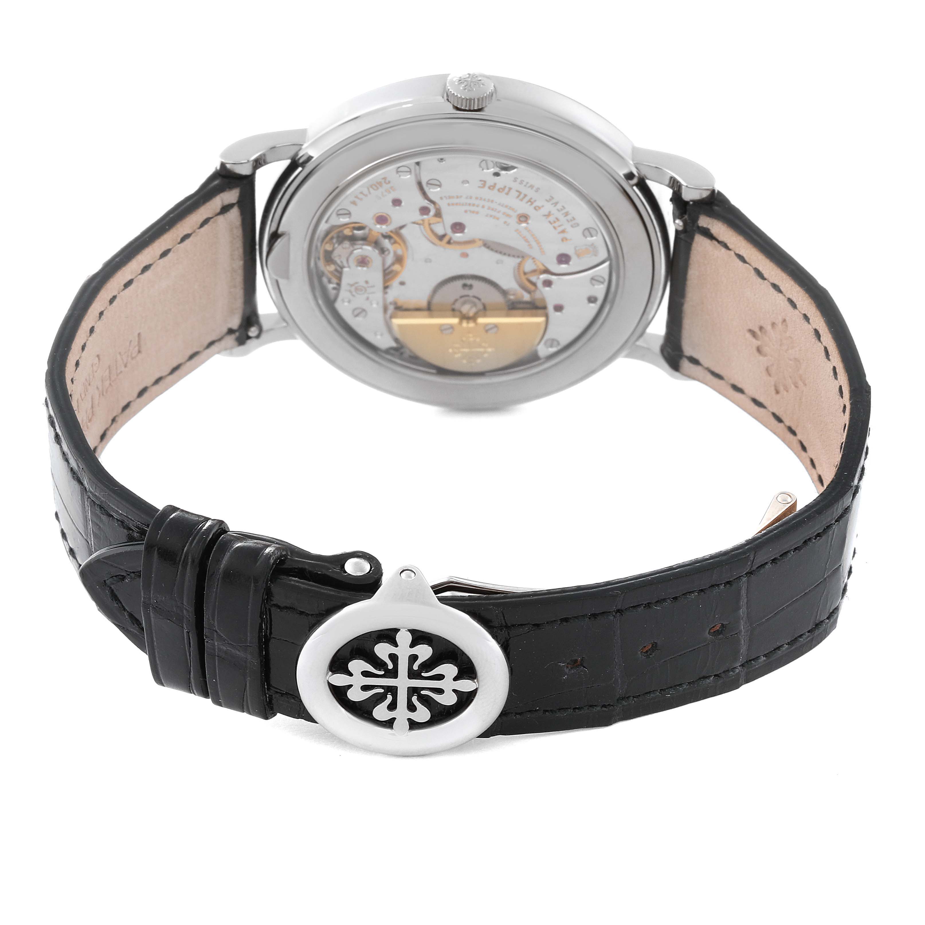 The image shows the back view of a Patek Philippe Complications 5139G-001 Men's White Gold Grey Dial 5139G-001 Men's White Gold Grey Dial watch, highlighting its movement and black leather strap.