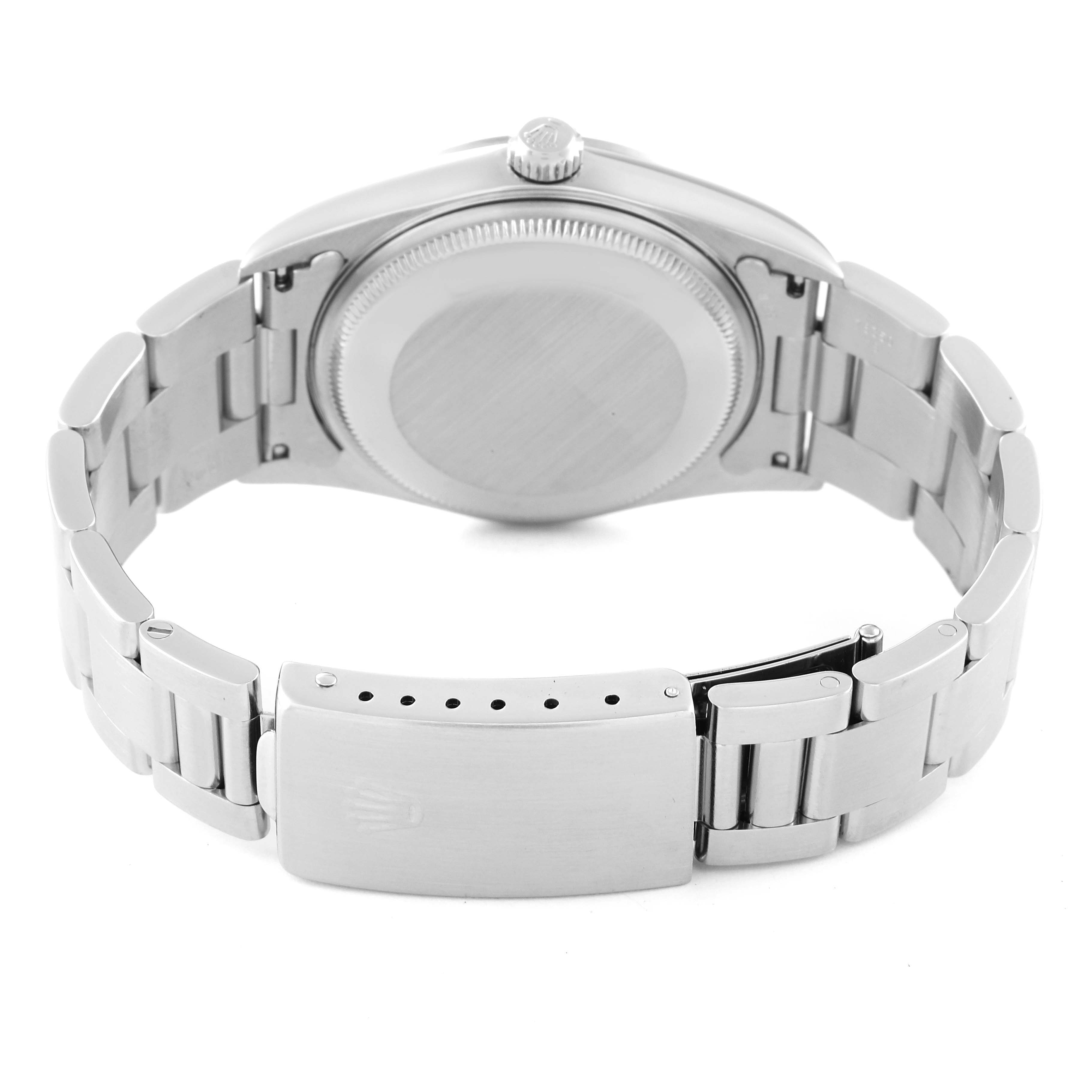 The image shows the back of an Air-King Rolex watch, displaying its case back and bracelet clasp.