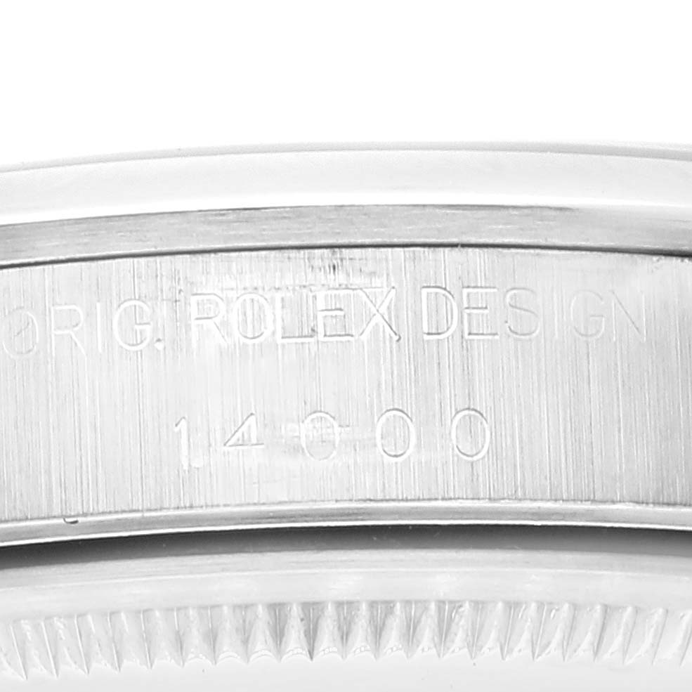 This close-up image shows the side of the casing of a Rolex Air-King 14000 Men's Stainless Steel Blue Dial 14000 Men's Stainless Steel Blue Dial watch, highlighting the engraved model number and brand.