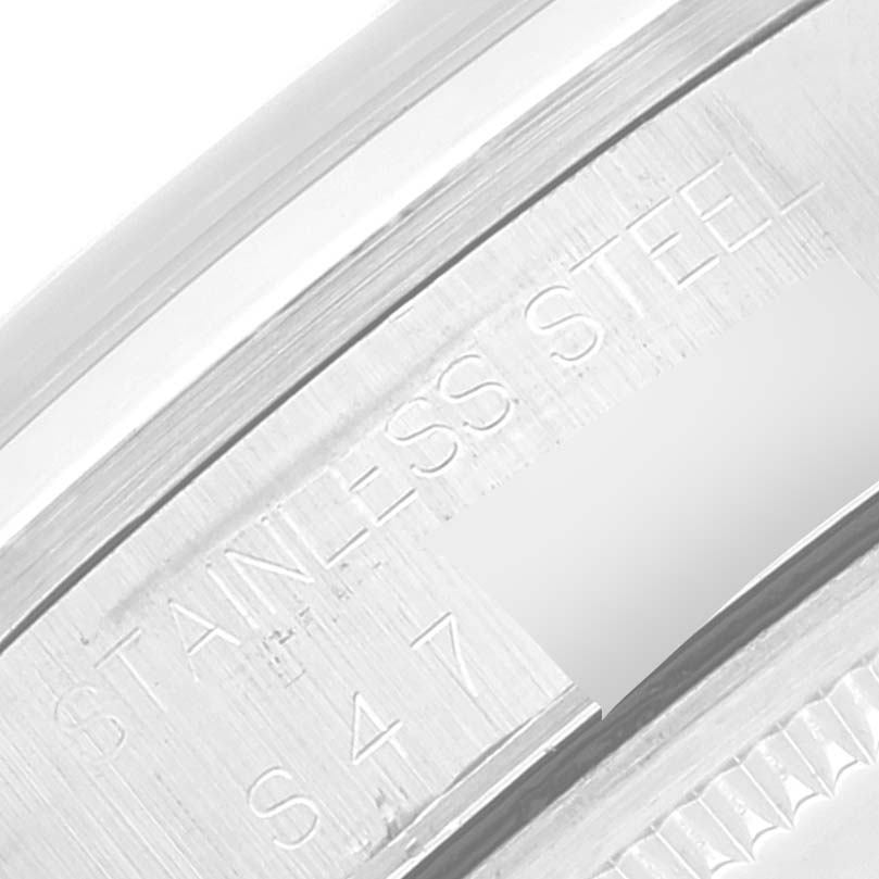 This image shows a close-up of the stainless steel bezel and engraved text on a Rolex Air-King 14000 Men's Stainless Steel White Dial 14000 Men's Stainless Steel White Dial watch.