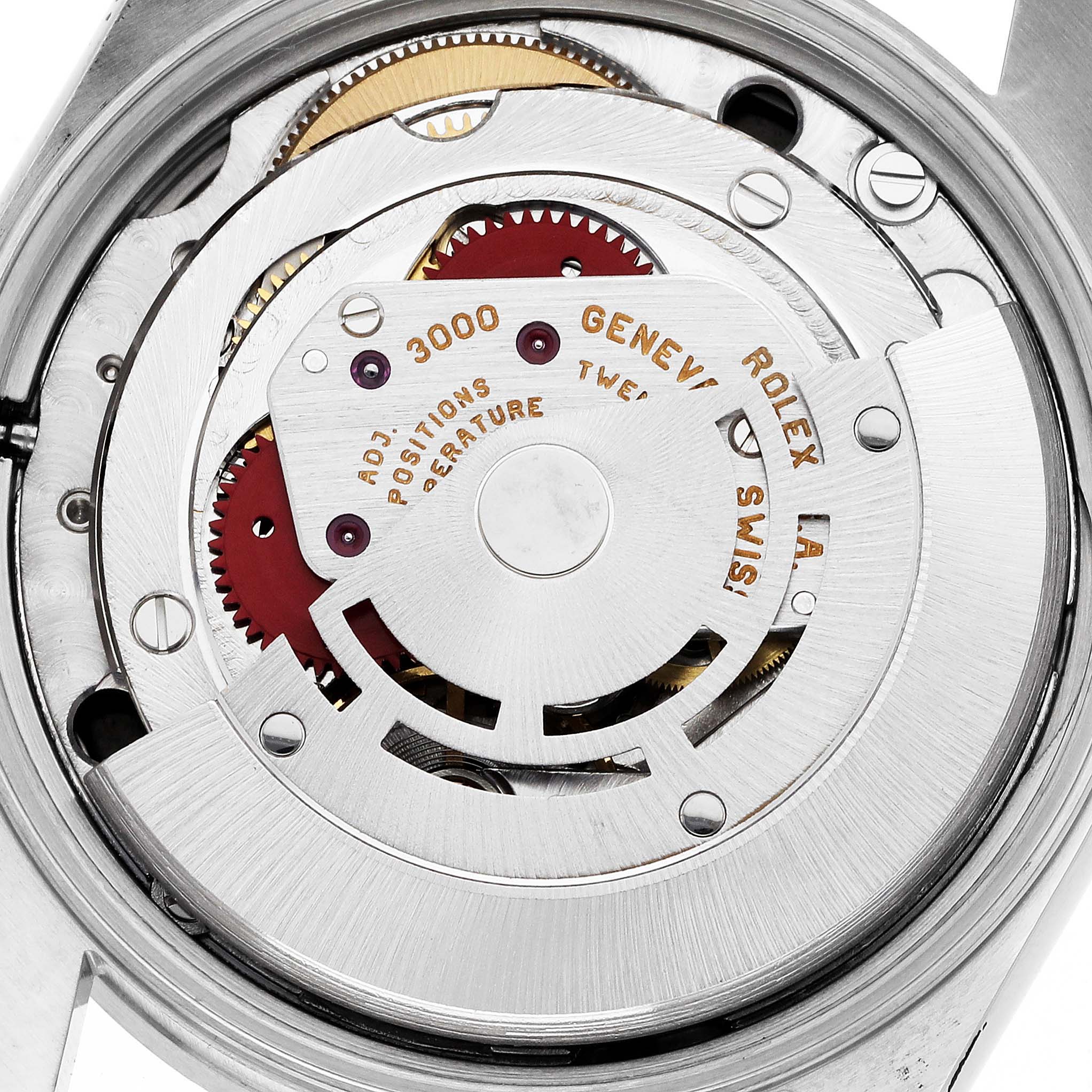 This image shows a close-up view of the movement mechanism inside the Rolex Air-King 14010 Men's Stainless Steel Black Dial 14010 Men's Stainless Steel Black Dial watch.