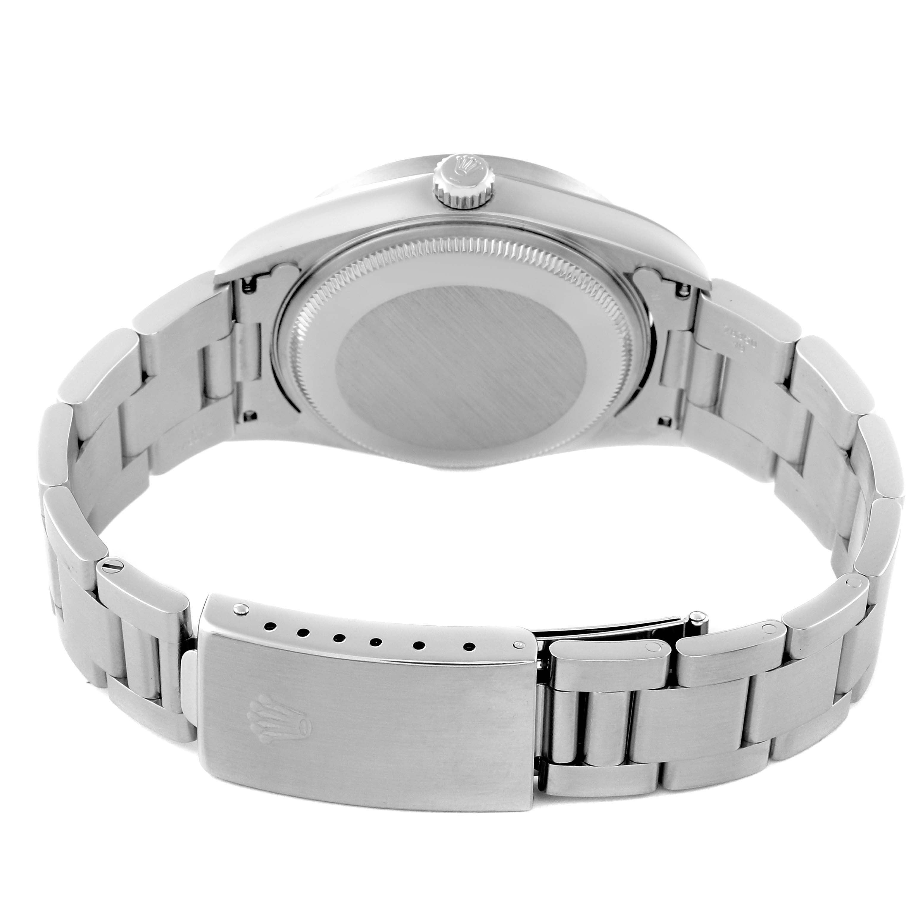 This image shows the back view of a Rolex Air-King 14010 Men's Stainless Steel Black Dial 14010 Men's Stainless Steel Black Dial watch, highlighting the case back and the bracelet with clasp.