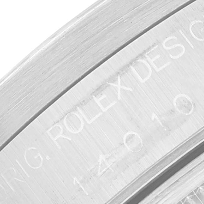 Close-up angled view of the engraved case back on a Rolex Air-King 14010 Men's Stainless Steel Silver Dial 14010 Men's Stainless Steel Silver Dial model watch.