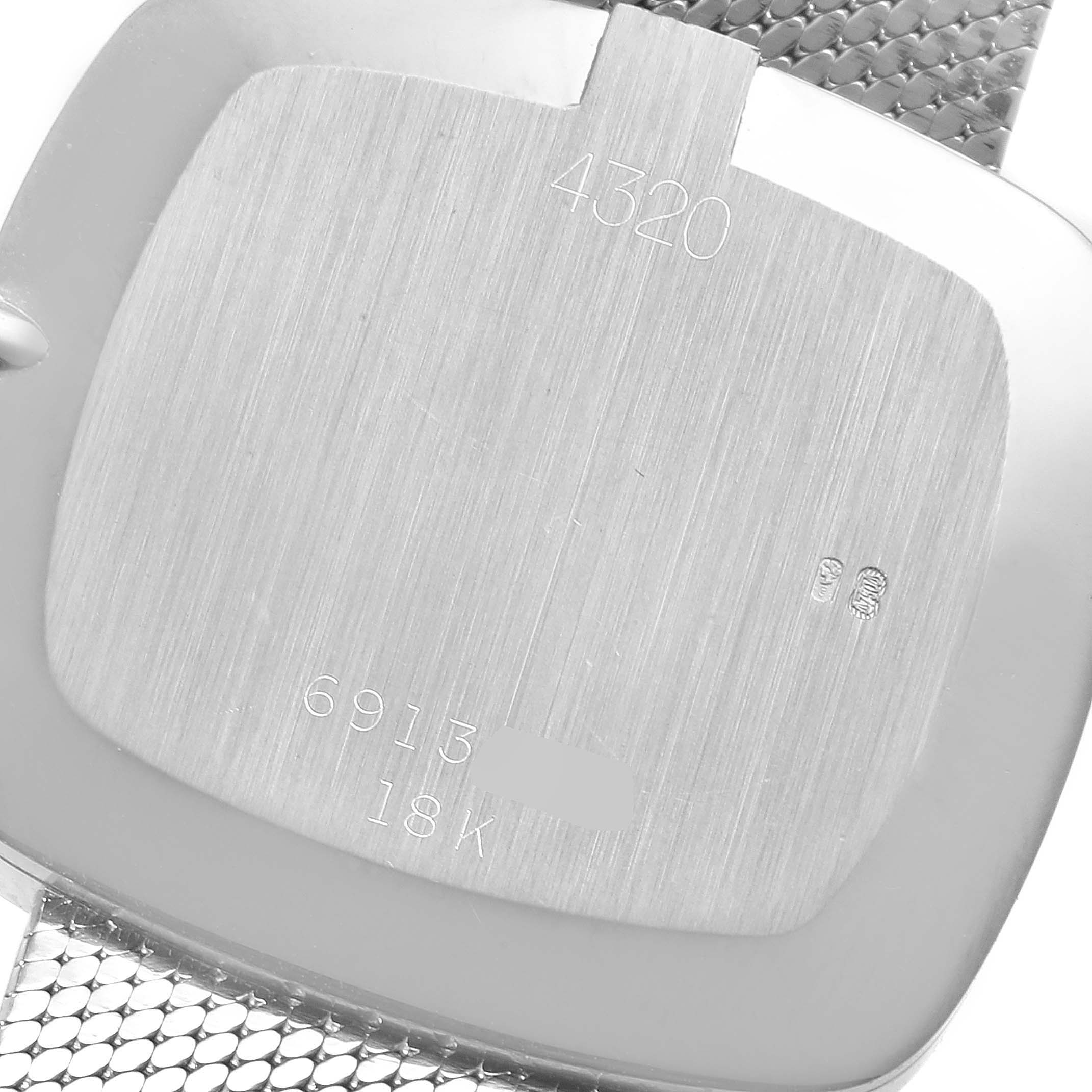 This is the back of a Rolex Cellini 4320 Men
s White Gold White Dial 4320 Men
s White Gold White Dial watch, showing its engraved model number and specifications.