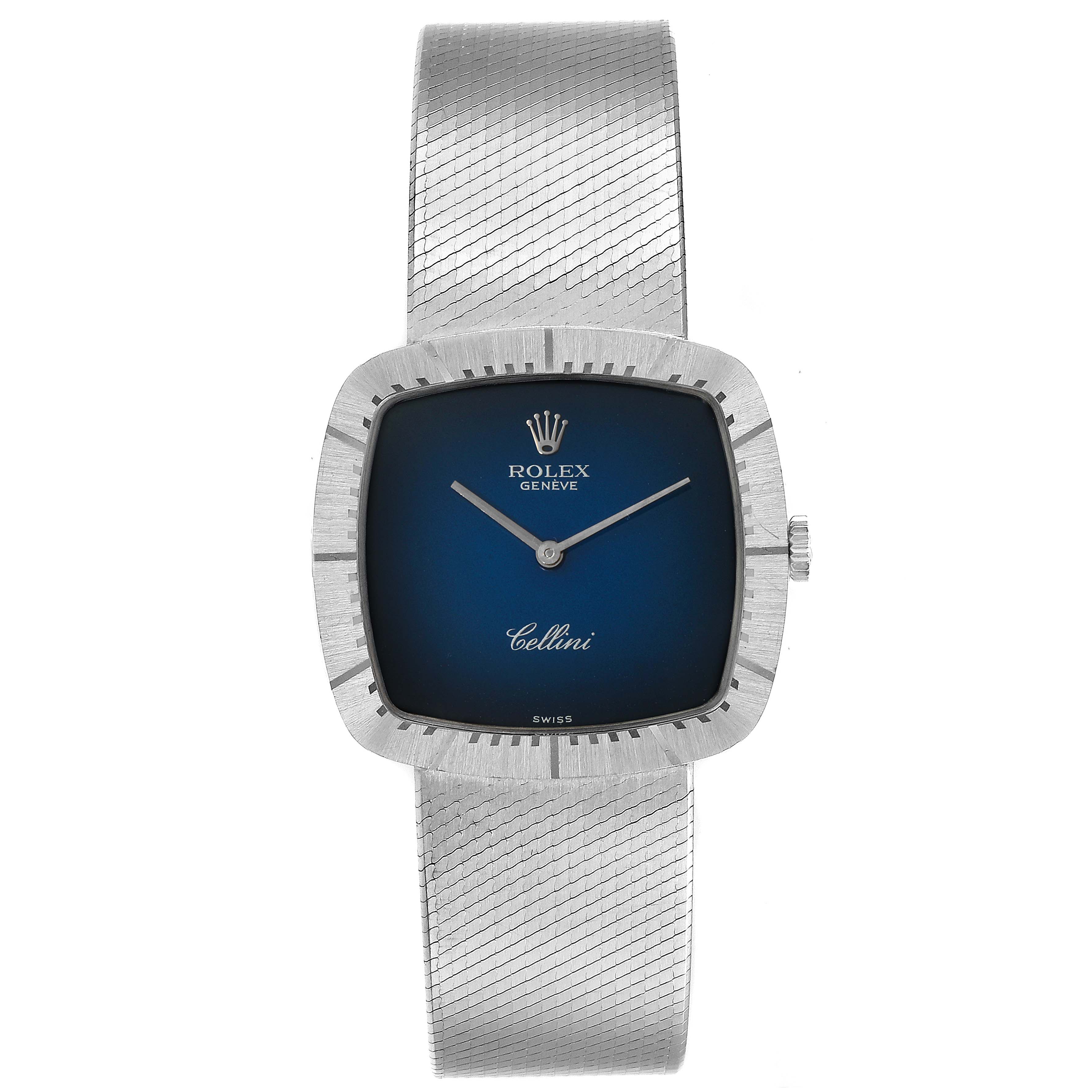 The image shows a front view of a Rolex Cellini 4320 Men
s White Gold White Dial 4320 Men
s White Gold White Dial watch with a blue dial, silver case, and matching mesh bracelet.