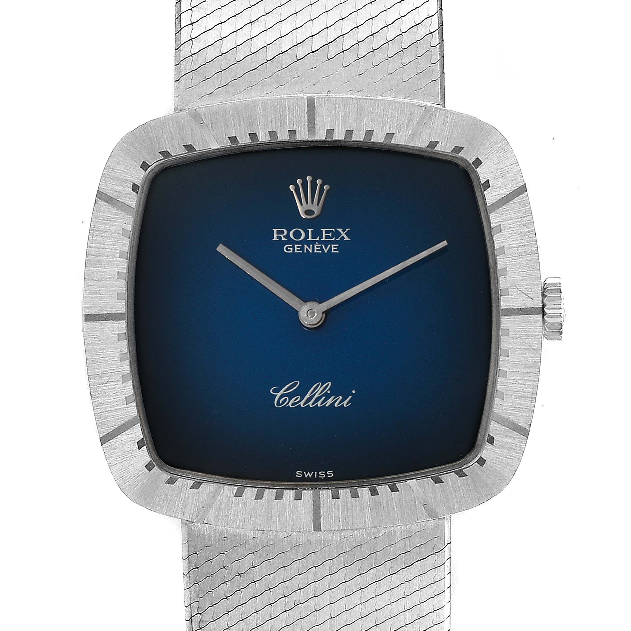 The Rolex Cellini 4320 Men
s White Gold White Dial 4320 Men
s White Gold White Dial watch is shown from the front, highlighting its square dial, blue face, and silver mesh band.