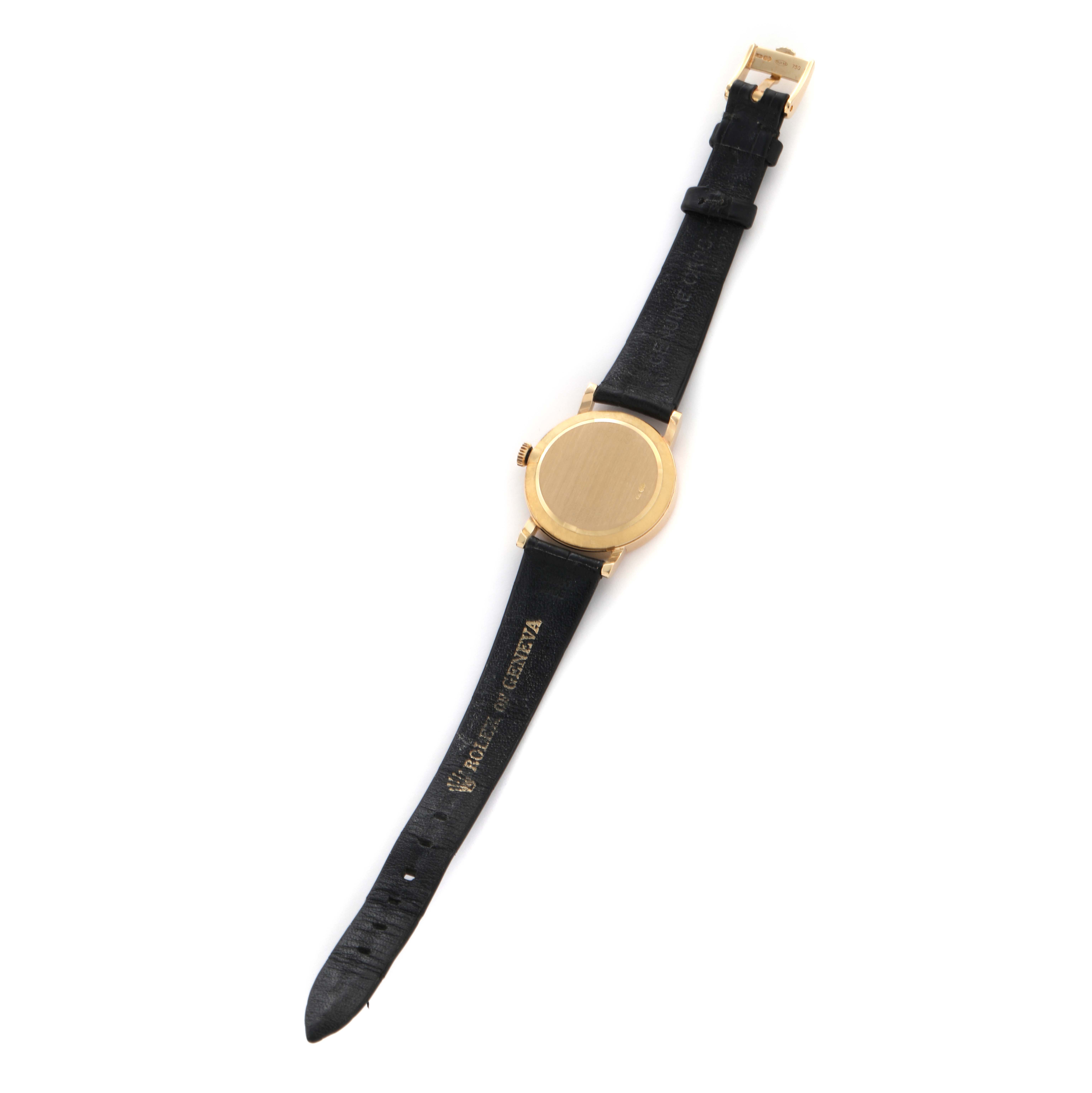 The Rolex Cellini 5109 Women
s Yellow Gold Mother of Pearl Dial 5109 Women
s Yellow Gold Mother of Pearl Dial watch is shown from the back, displaying its strap and buckle.