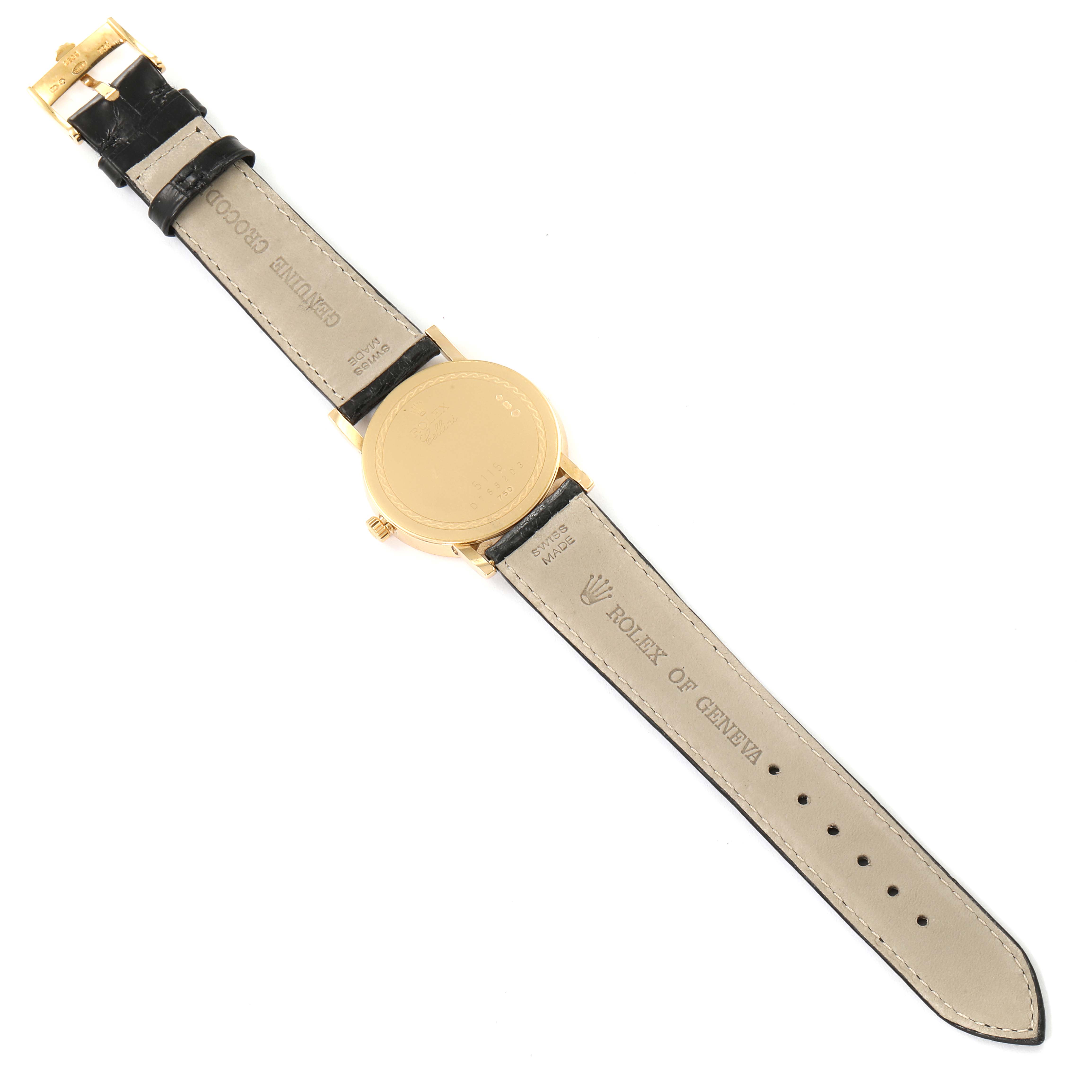 The image shows the back view of a Rolex Cellini 5115 Men's Yellow Gold Silver Dial 5115 Men's Yellow Gold Silver Dial watch, including the leather strap and the closed clasp.
