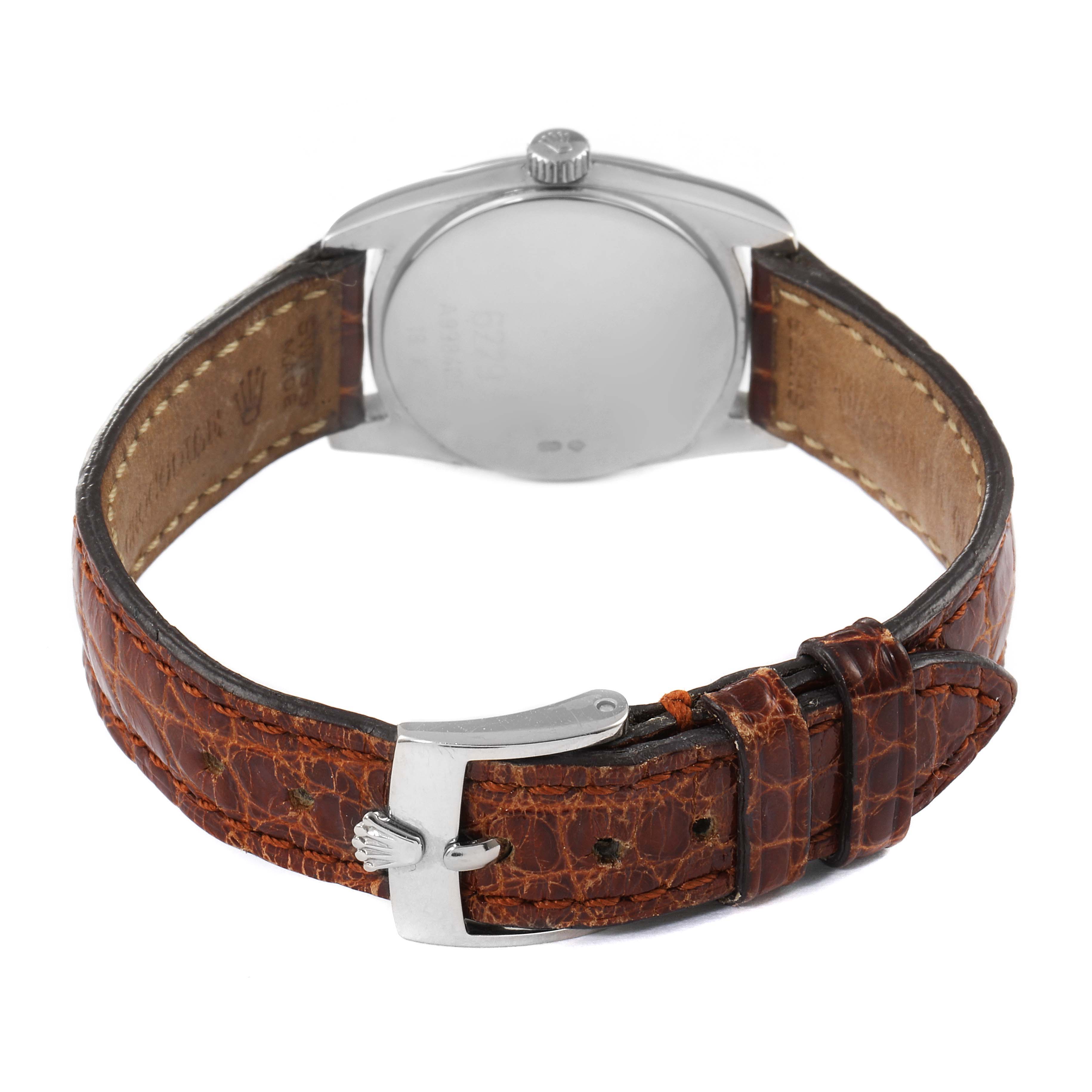 The image shows the back view and leather strap of a Rolex Cellini 6229 Women's White Gold White Dial 6229 Women's White Gold White Dial watch.