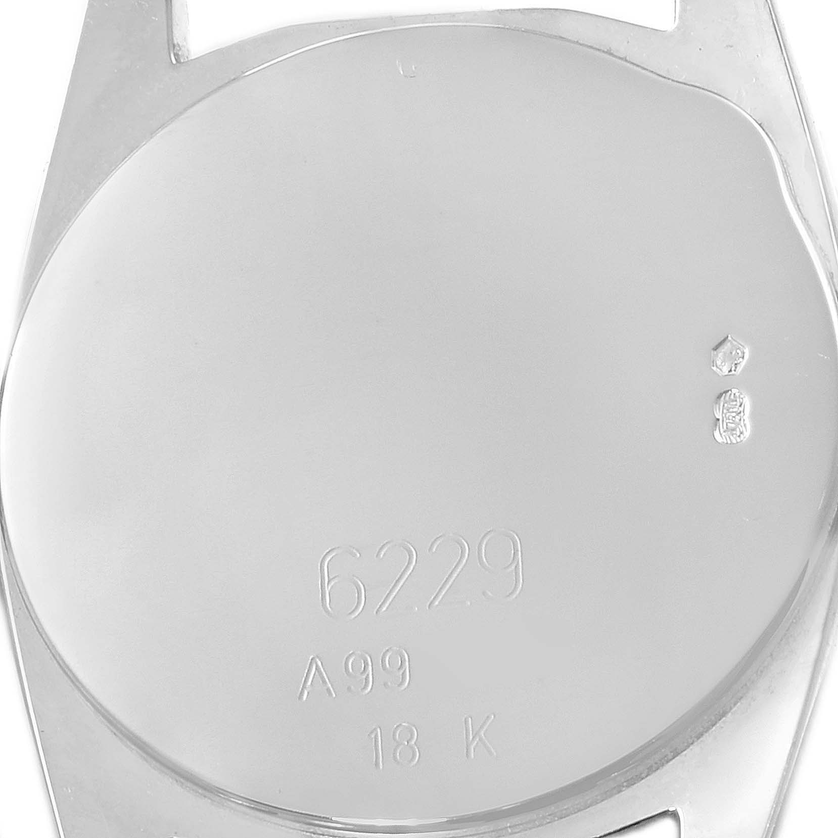This image shows the back case of a Rolex Cellini 6229 Women's White Gold White Dial 6229 Women's White Gold White Dial watch model 6229, indicating it is made of 18K gold.