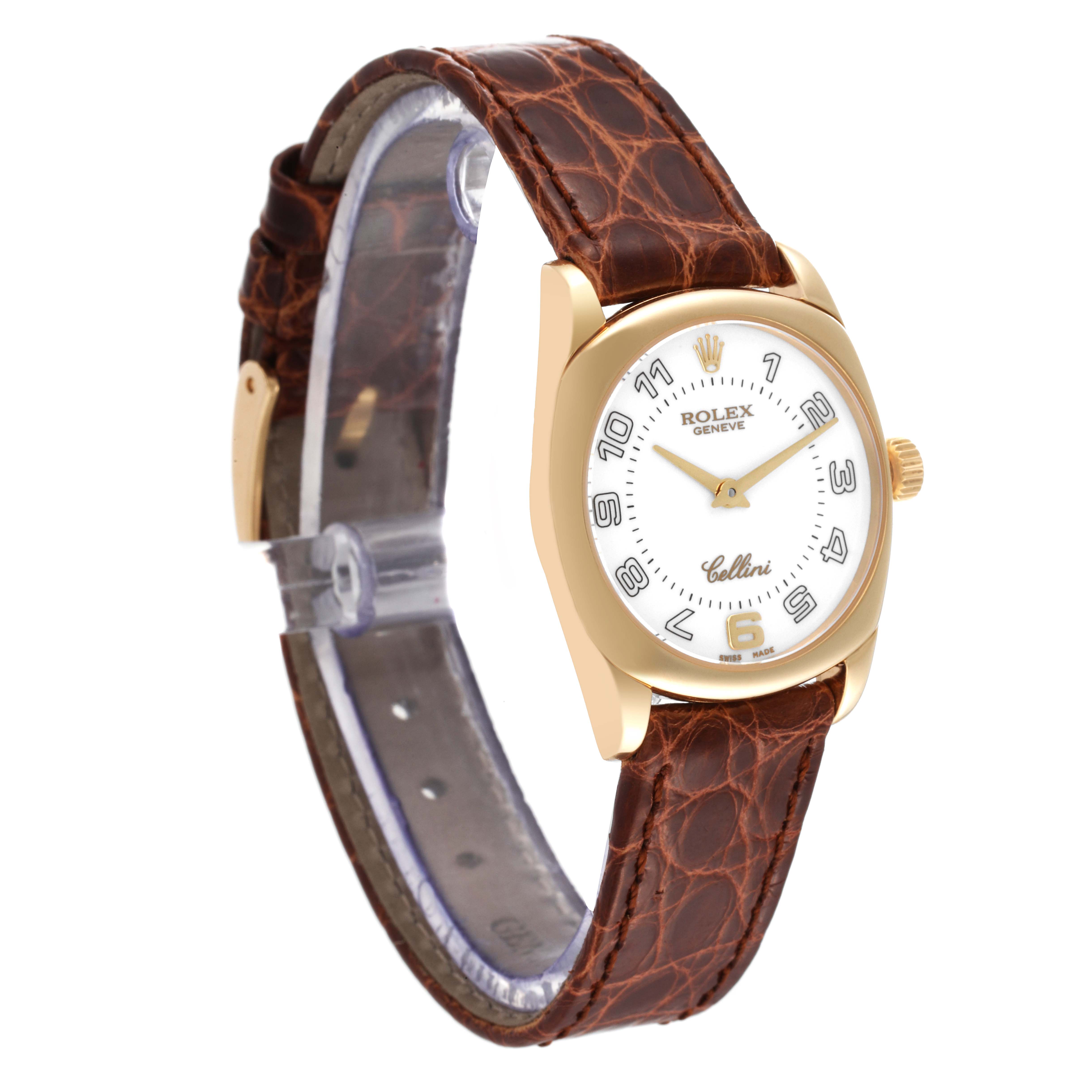 The Rolex Cellini 6229 Women's Yellow Gold White Dial 6229 Women's Yellow Gold White Dial watch is shown at an angle showcasing its face, crown, and full leather strap.