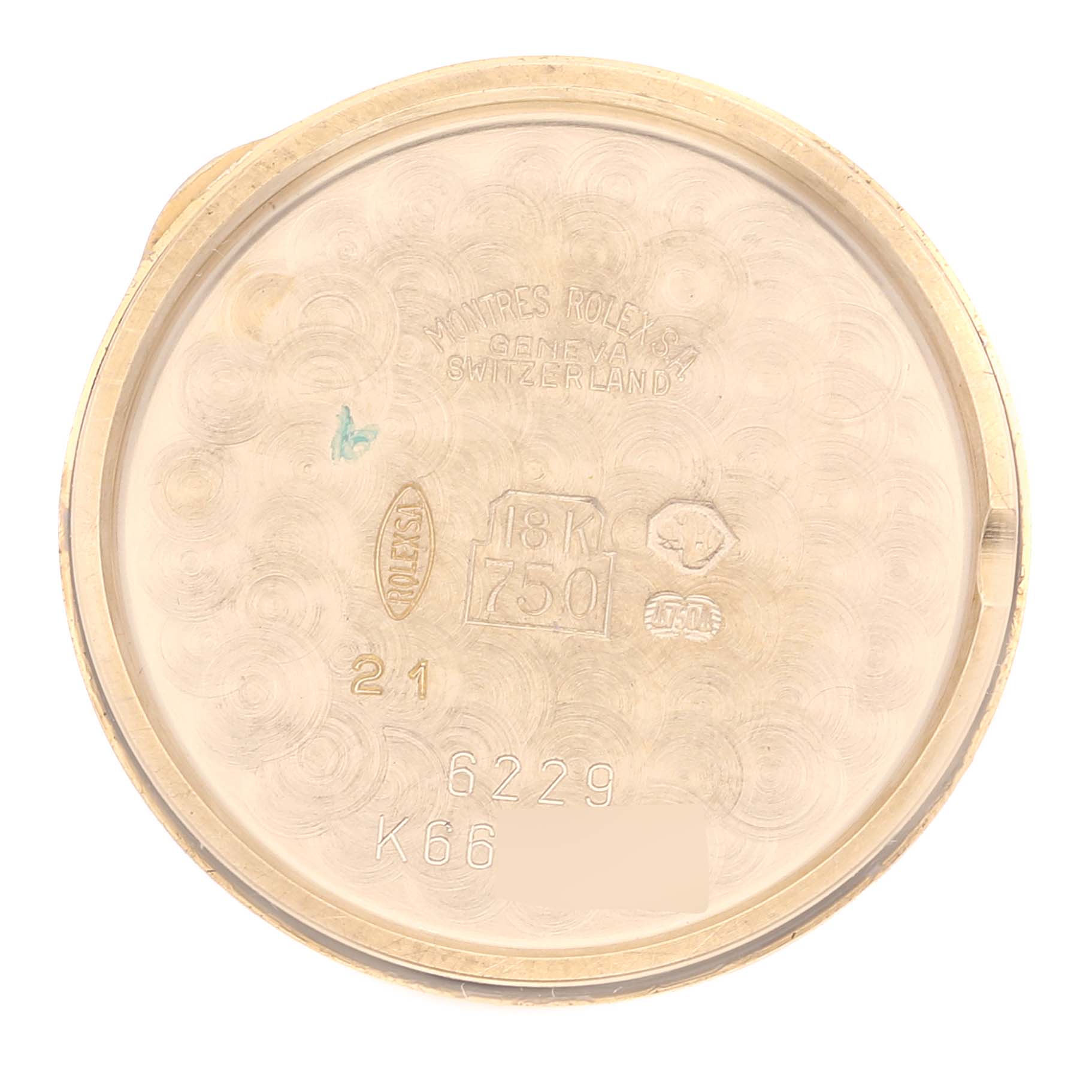 The image shows the inside of a gold case back for a Rolex Cellini 6229 Women's Yellow Gold White Dial 6229 Women's Yellow Gold White Dial watch.