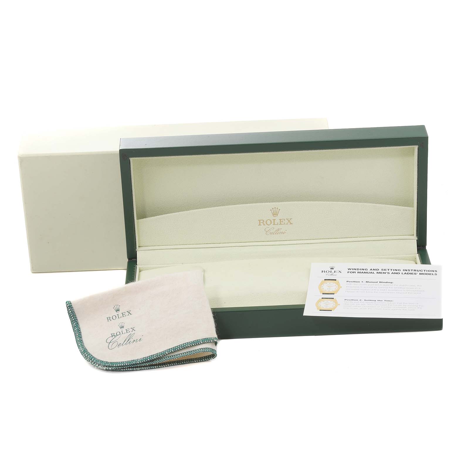 The image shows an open Rolex Cellini 6229 Women's Yellow Gold White Dial 6229 Women's Yellow Gold White Dial watch box, cleaning cloth, and instruction manual.
