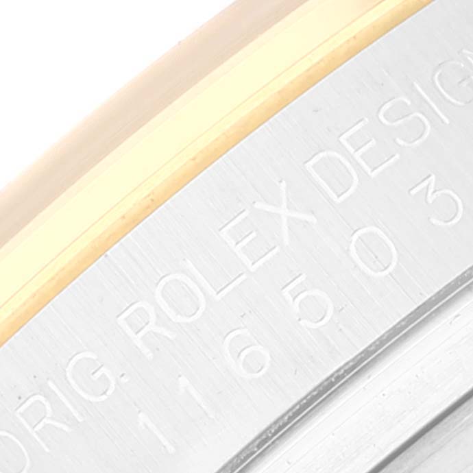This image shows a close-up of the side engraving on the case of a Rolex Daytona 116503 Men's Steel and Gold (two tone) Black Dial 116503 Men's Steel and Gold (two tone) Black Dial watch.