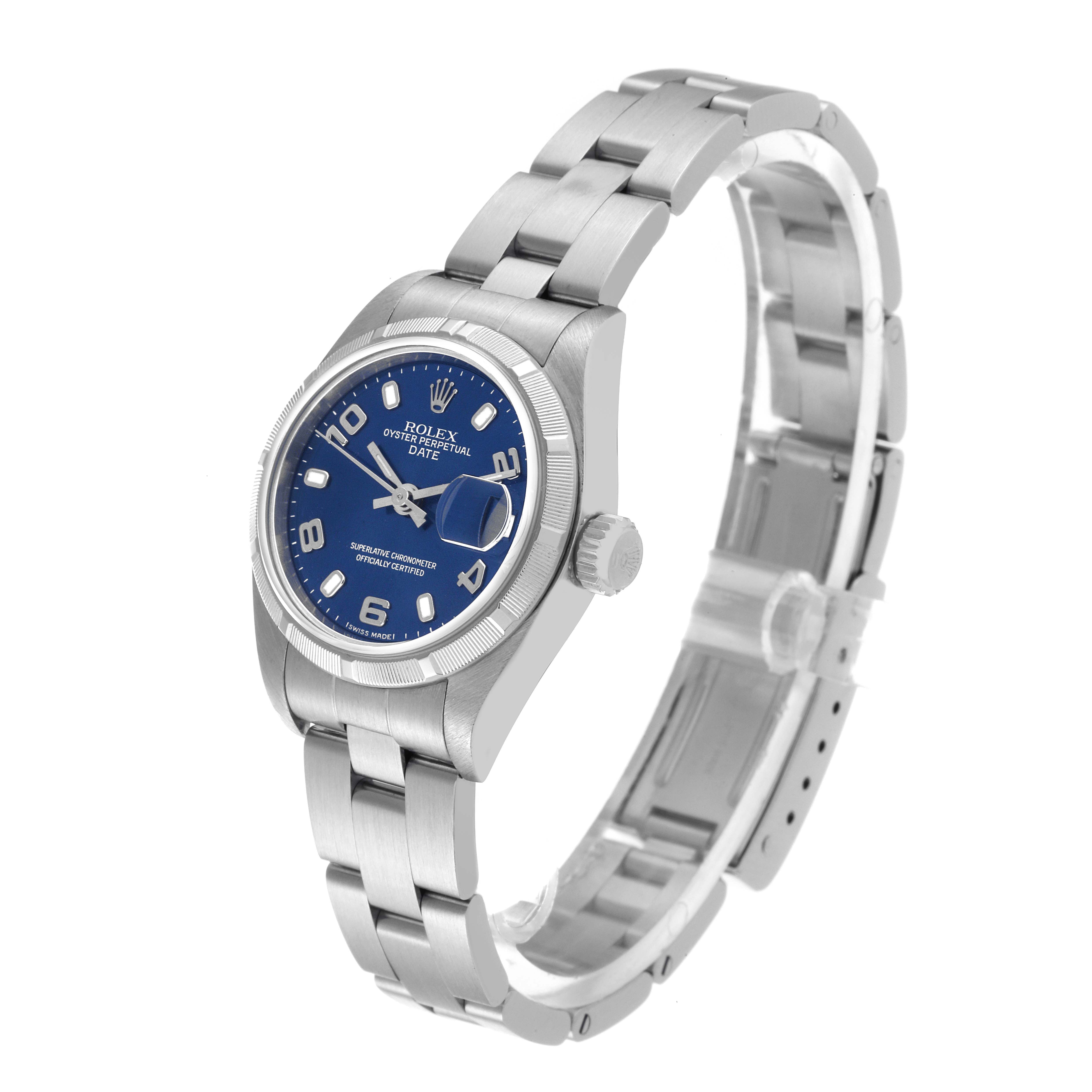 The Rolex Datejust 79190 Women's Stainless Steel Blue Dial 79190 Women's Stainless Steel Blue Dial watch is shown at an angled side view, highlighting the dial, crown, and bracelet.
