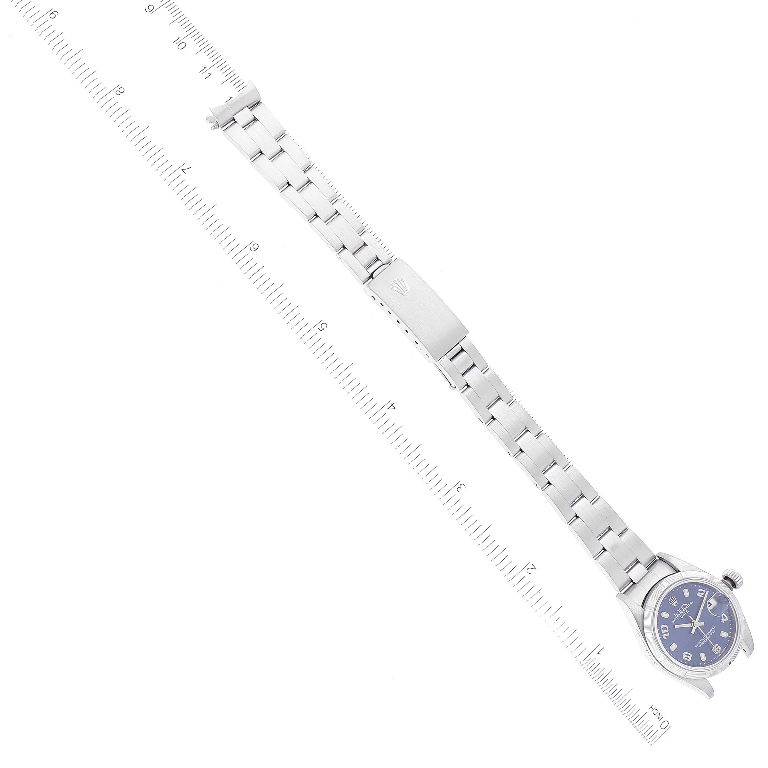 This image shows a Rolex Datejust 79190 Women's Stainless Steel Blue Dial 79190 Women's Stainless Steel Blue Dial watch from an overhead angle, displaying the watch face, bracelet, and clasp.